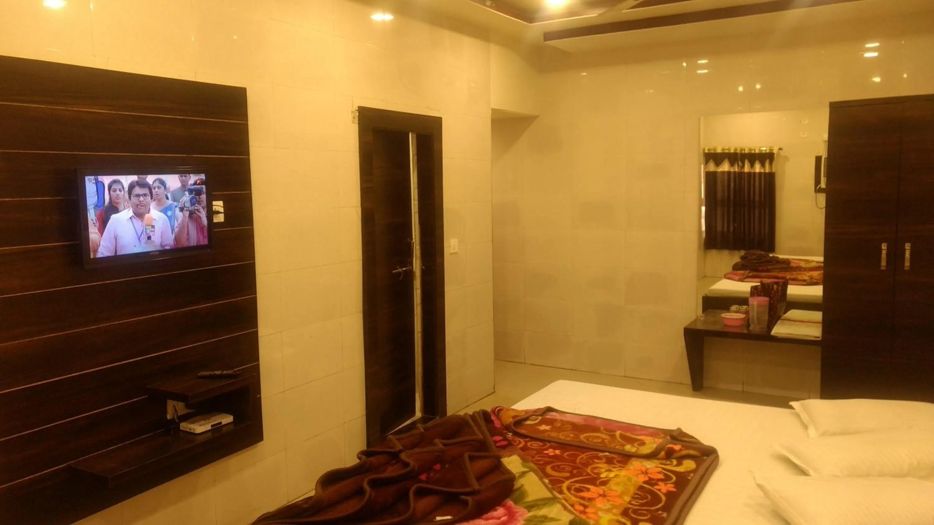 Bed in Ashiyana Inn Hotel