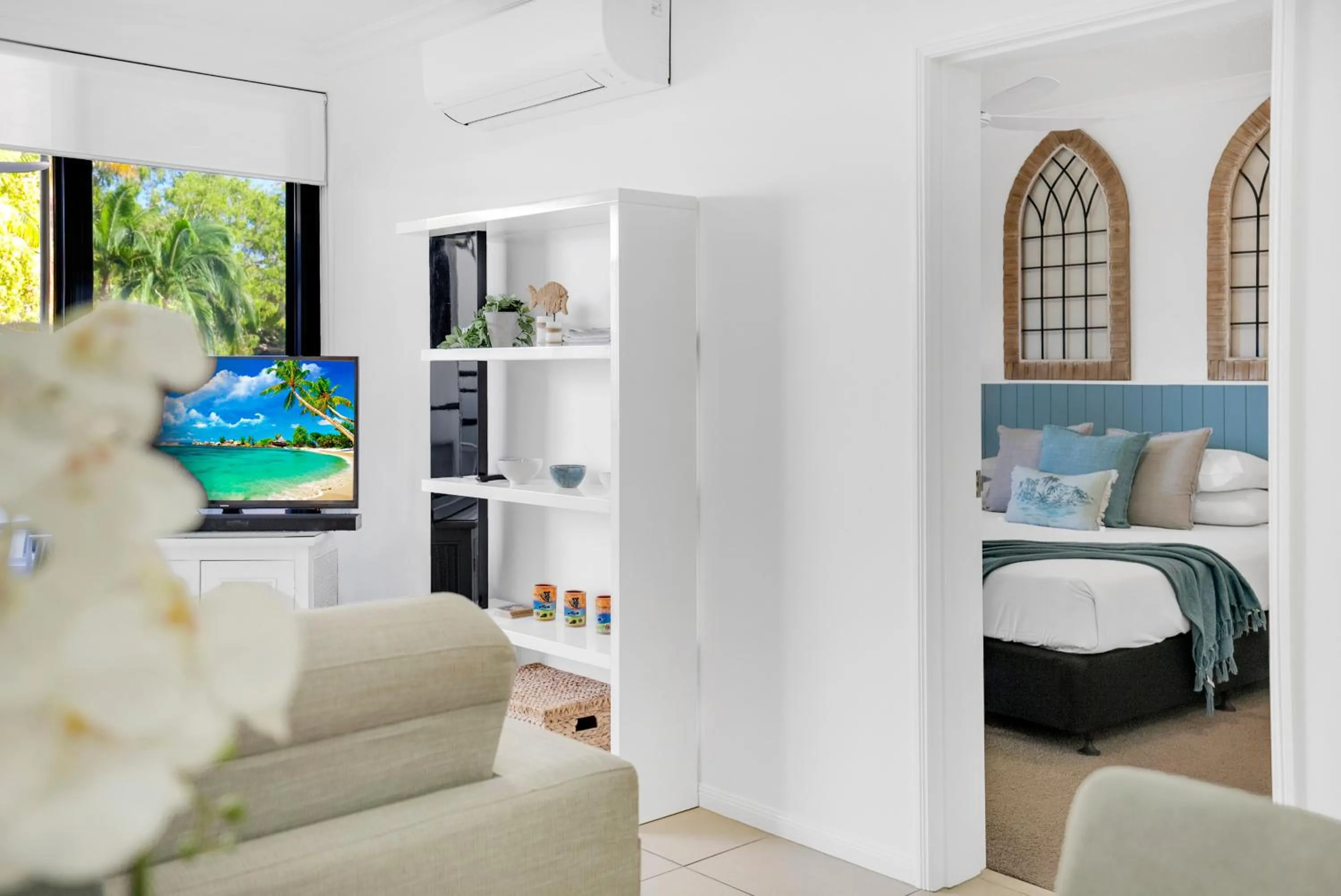 Bed in Elysium Apartments