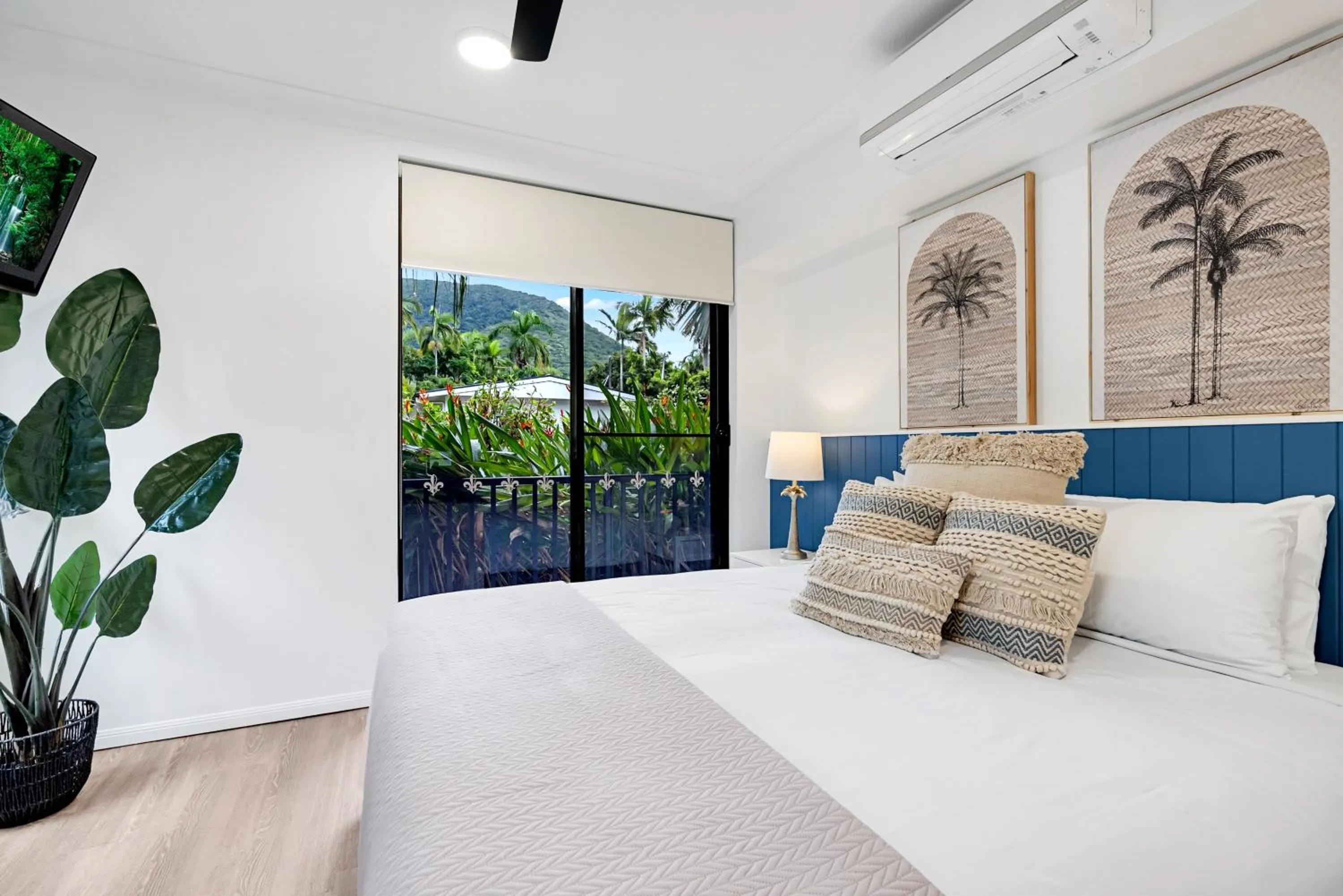 Bed in Elysium Apartments