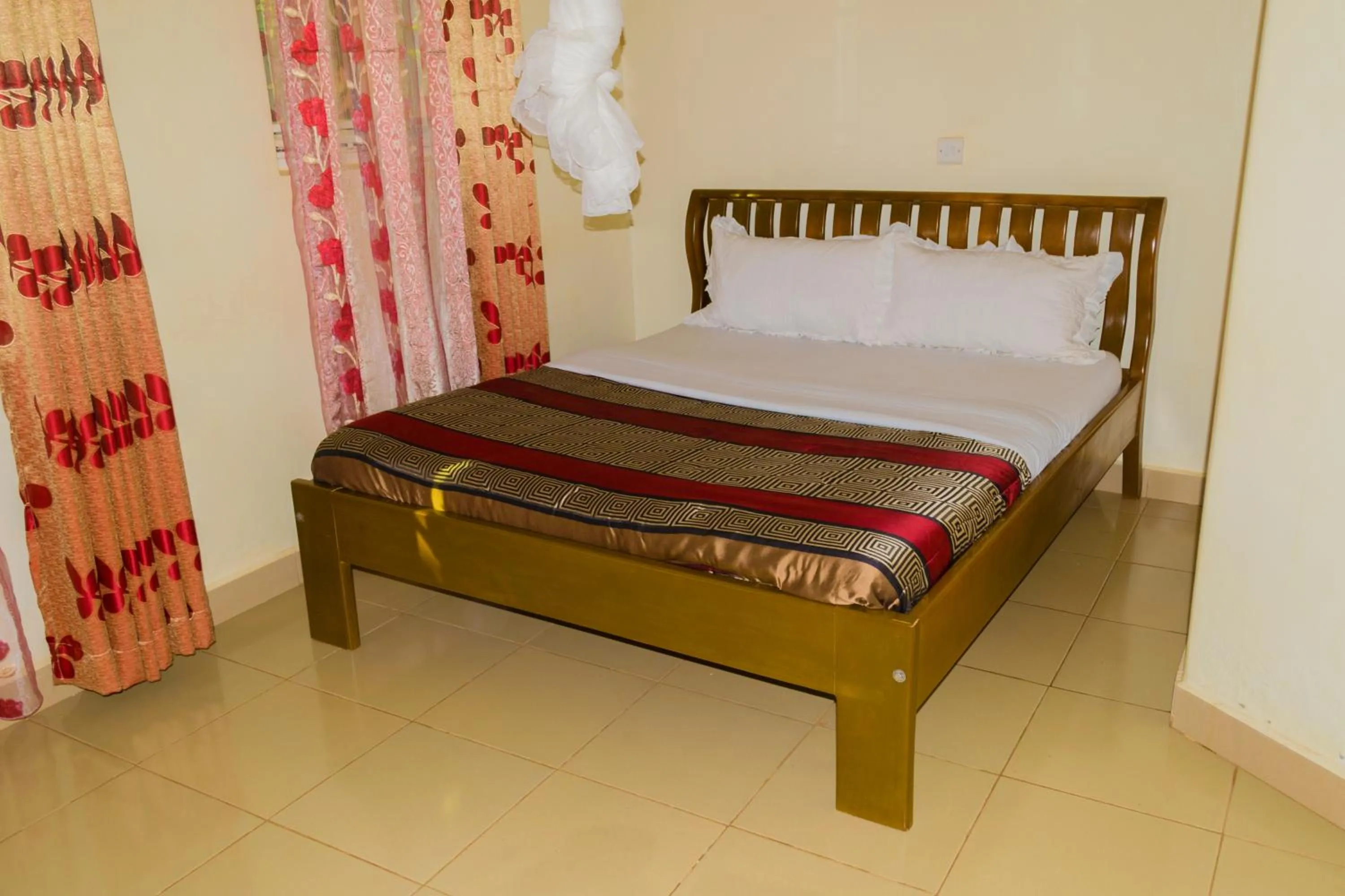 Photo of the whole room in Sadrina Comfort Cottages Kyanja Kampala