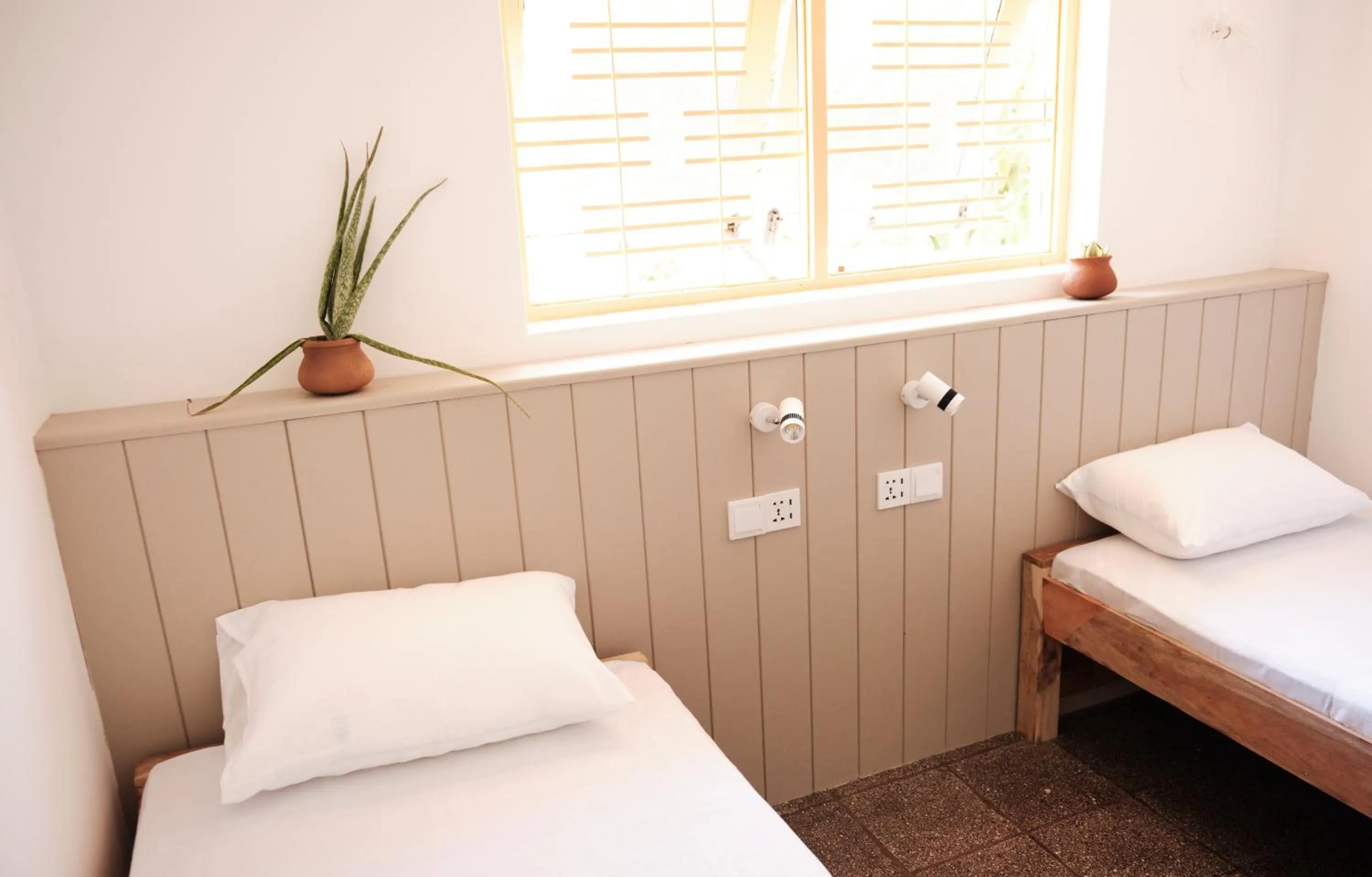 Bed in Basecamp Yoga Beach House