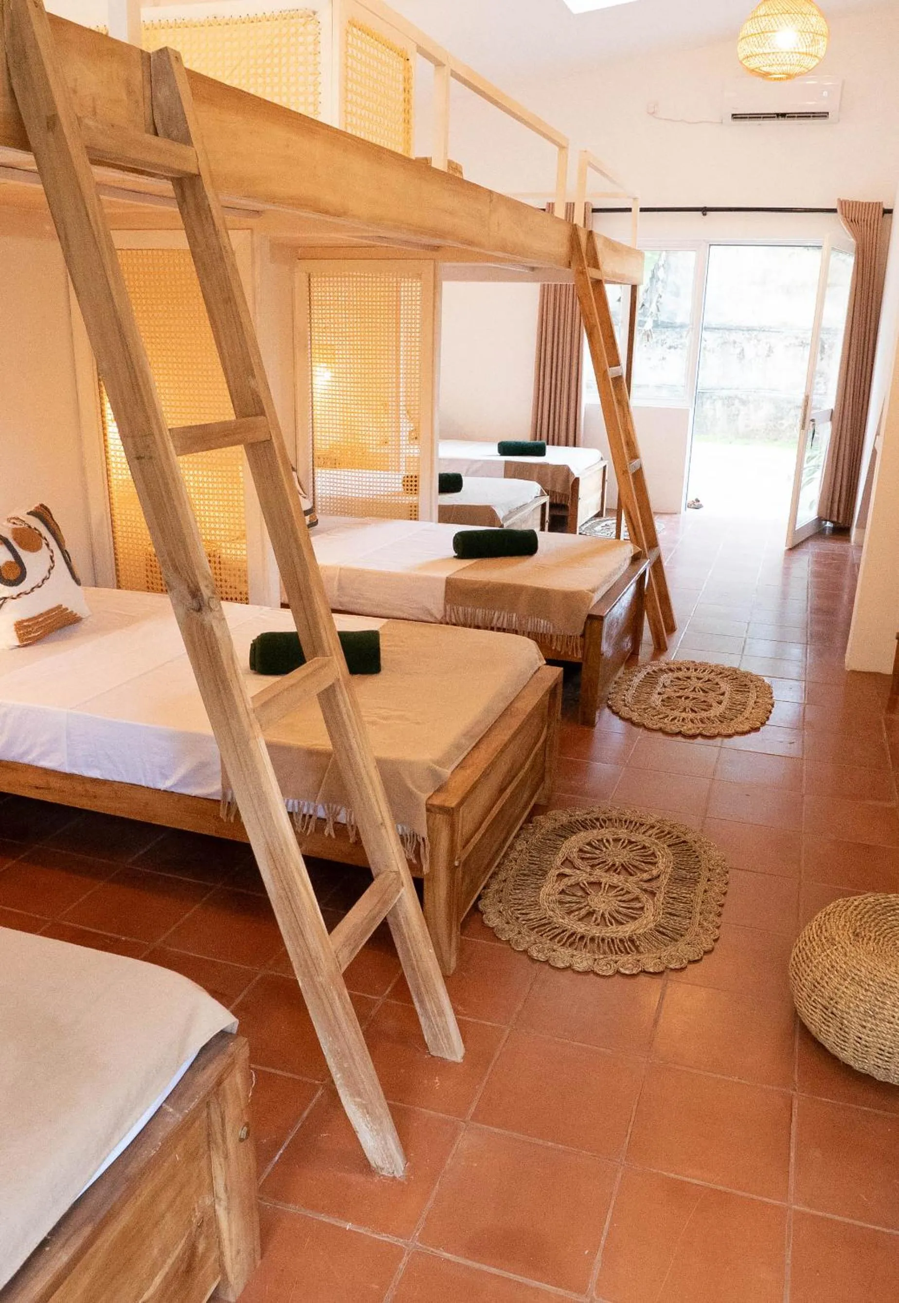 Bed in Basecamp Yoga Beach House