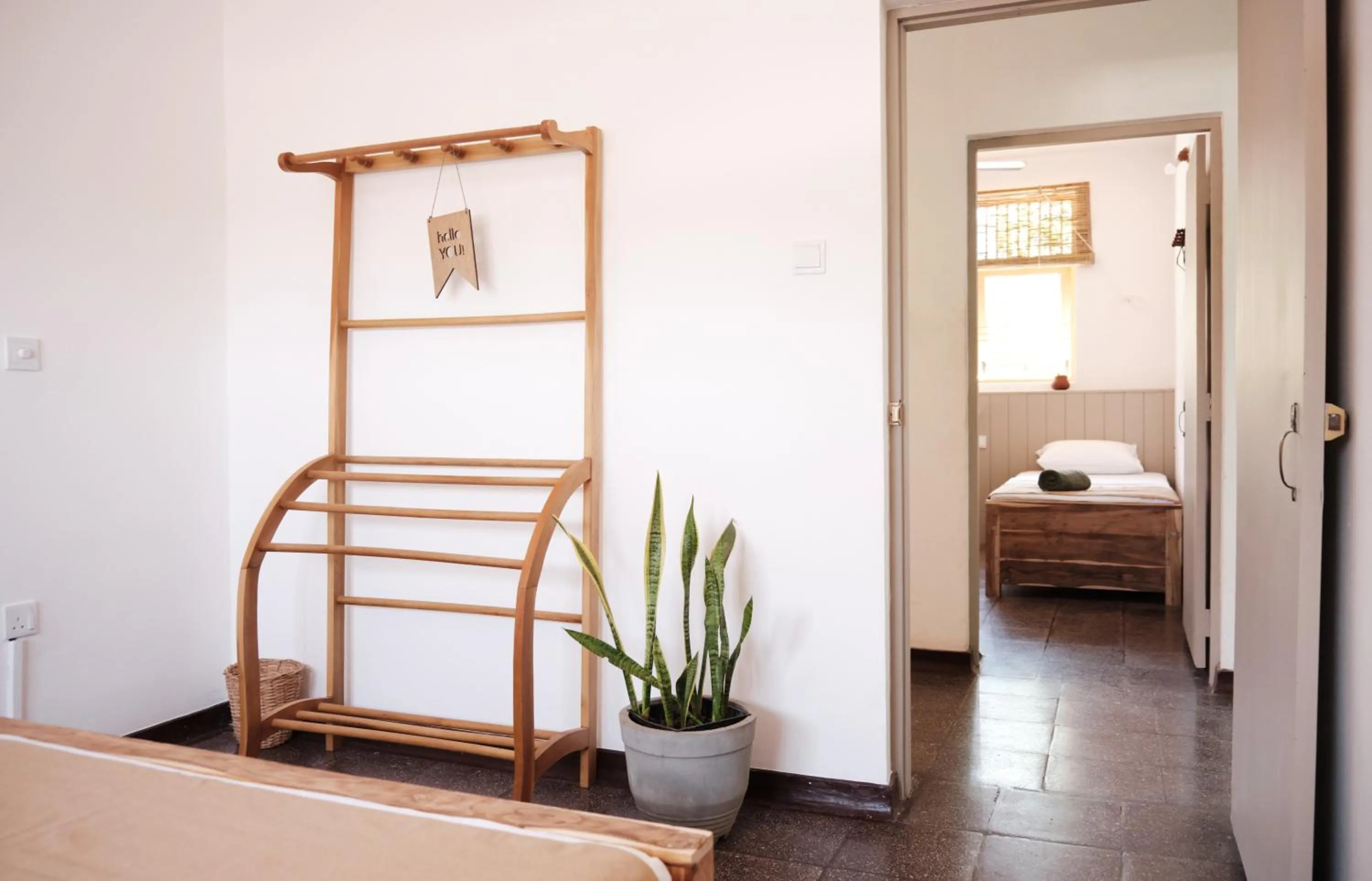 Bed in Basecamp Yoga Beach House
