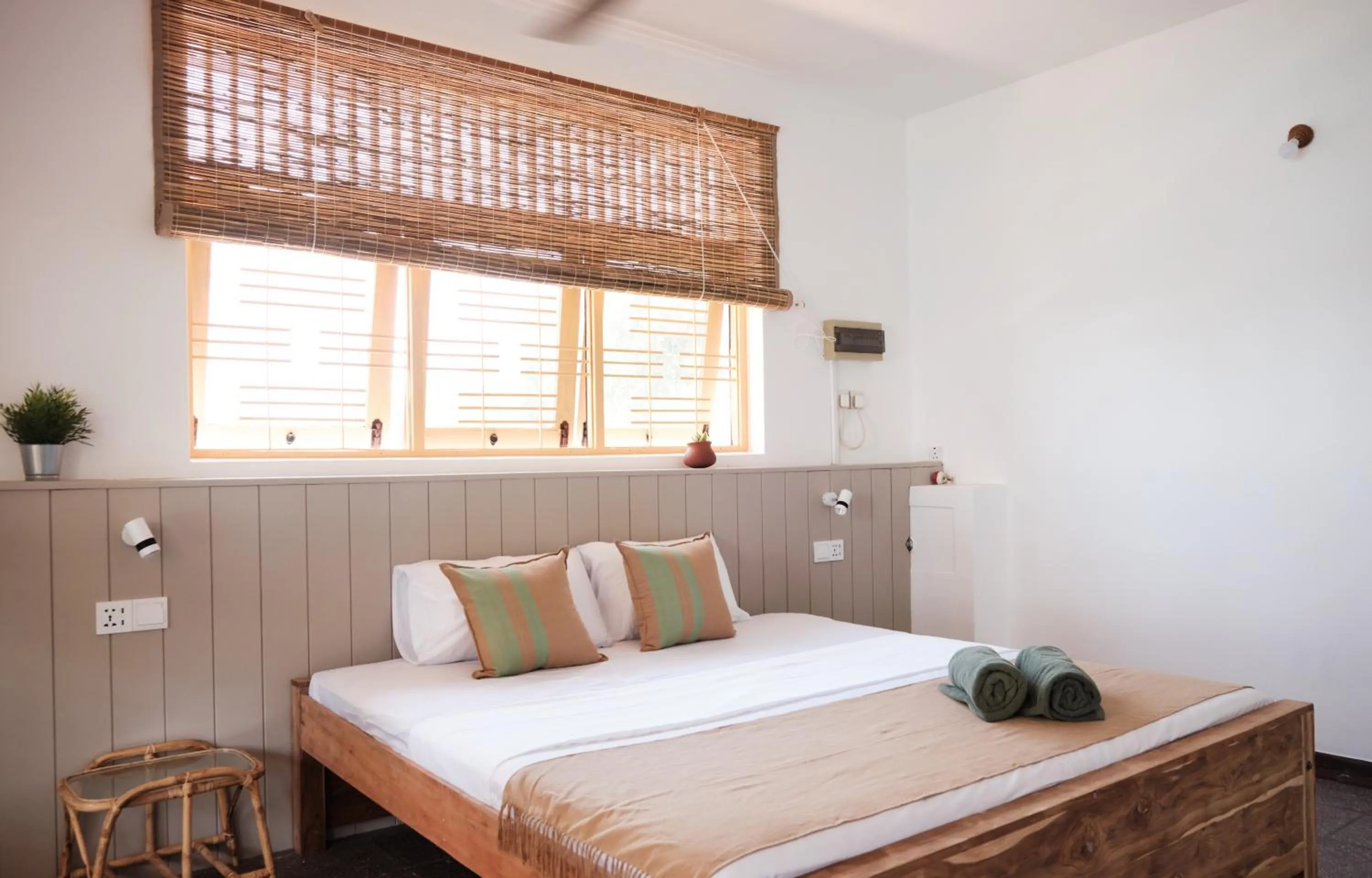 Bed in Basecamp Yoga Beach House