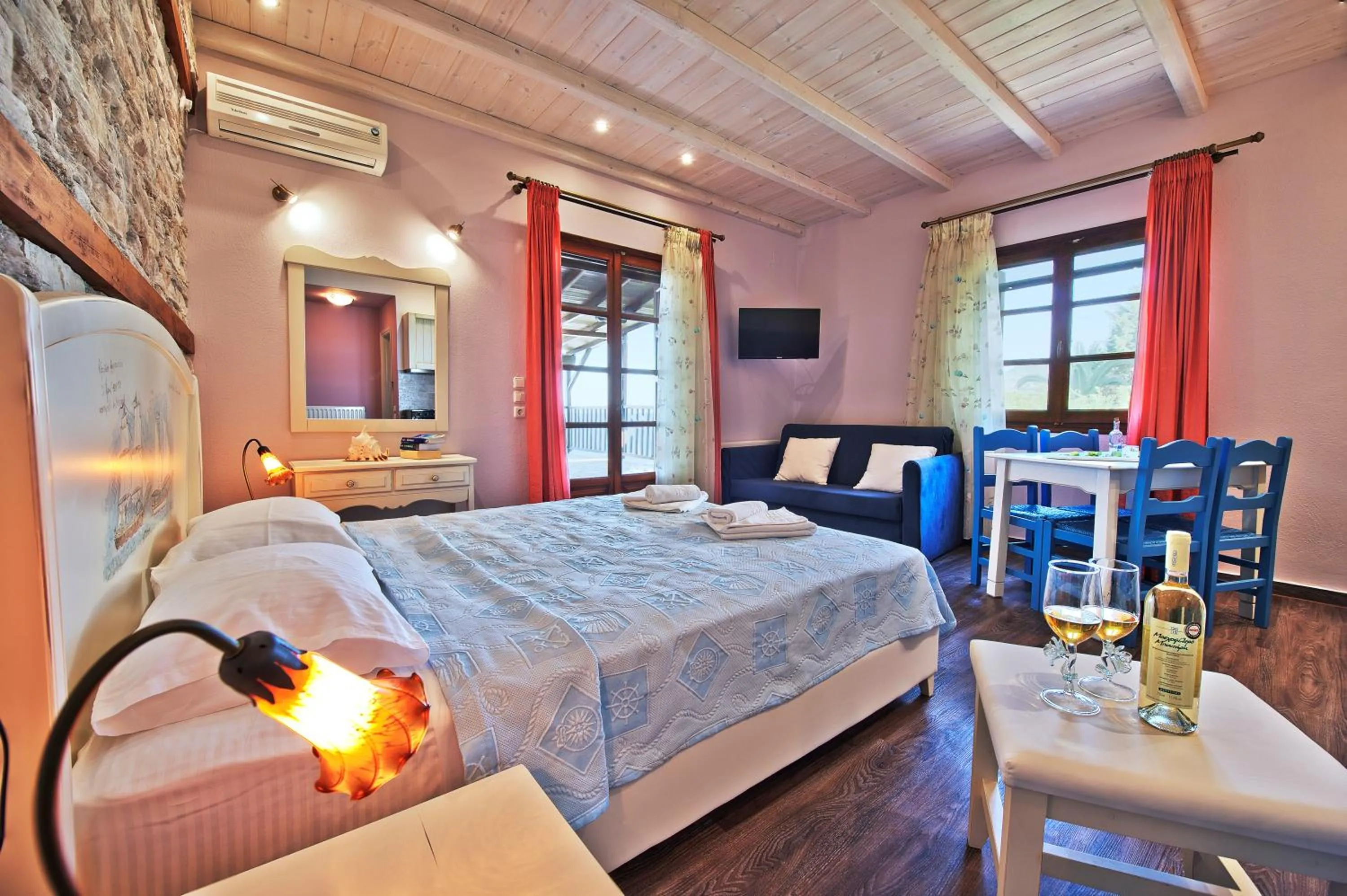 Photo of the whole room, Bed in Flamingo Hotel Pelion - Seaside Superior Studios & Suites