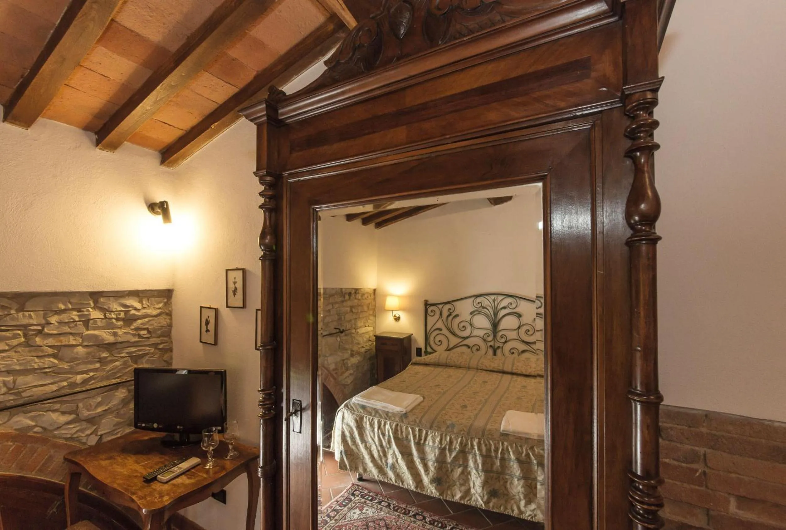 Bed in Relais Santa Cristina