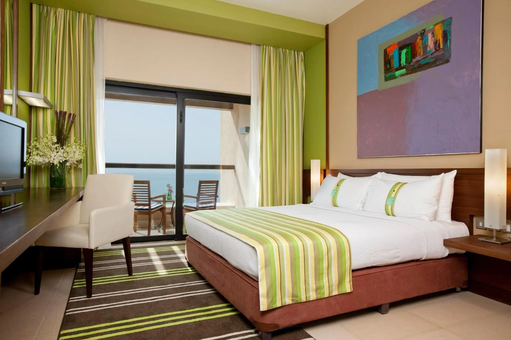 Photo of the whole room, Bed in Holiday Inn Resort Dead Sea by IHG