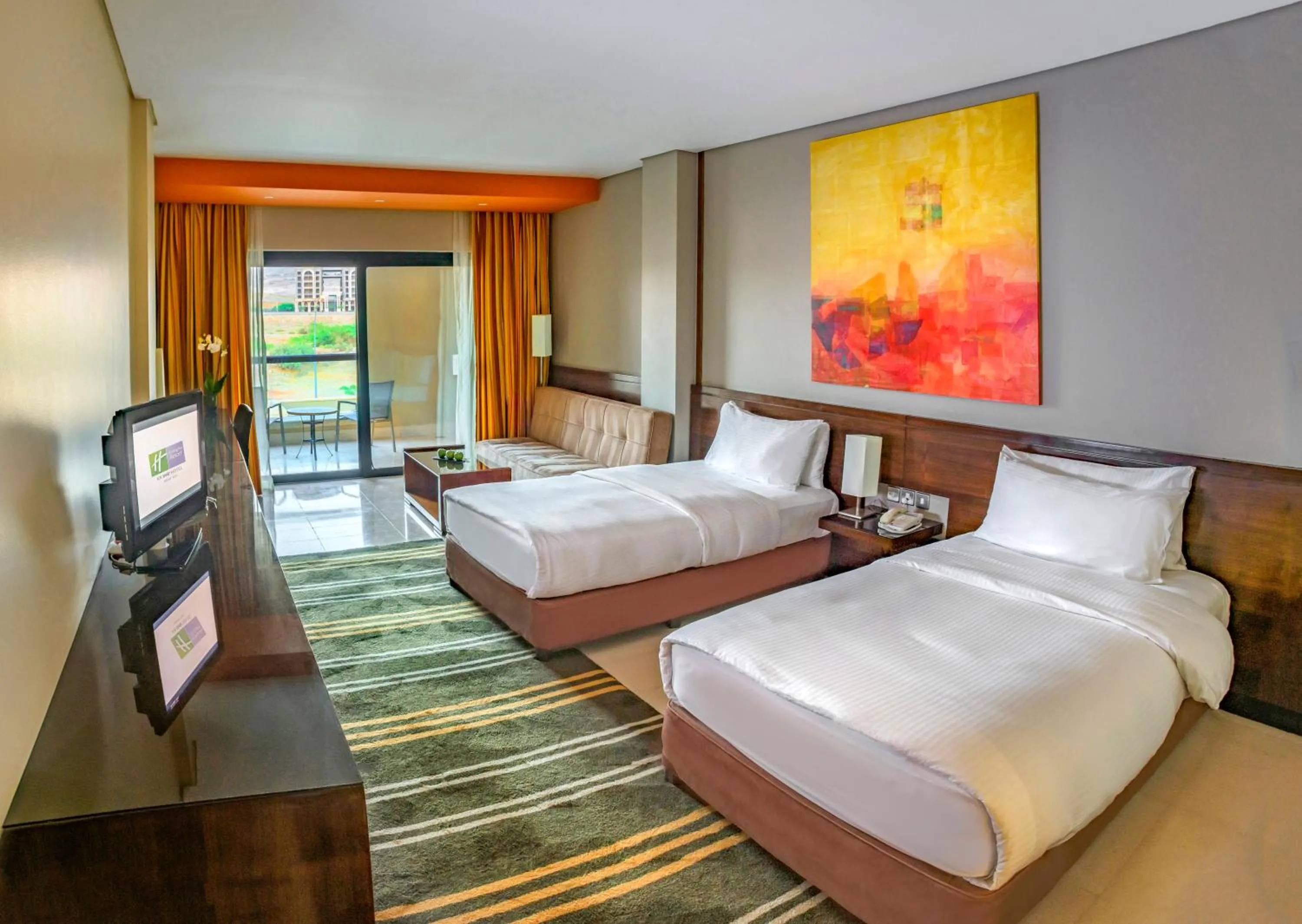 Photo of the whole room, Bed in Holiday Inn Resort Dead Sea by IHG