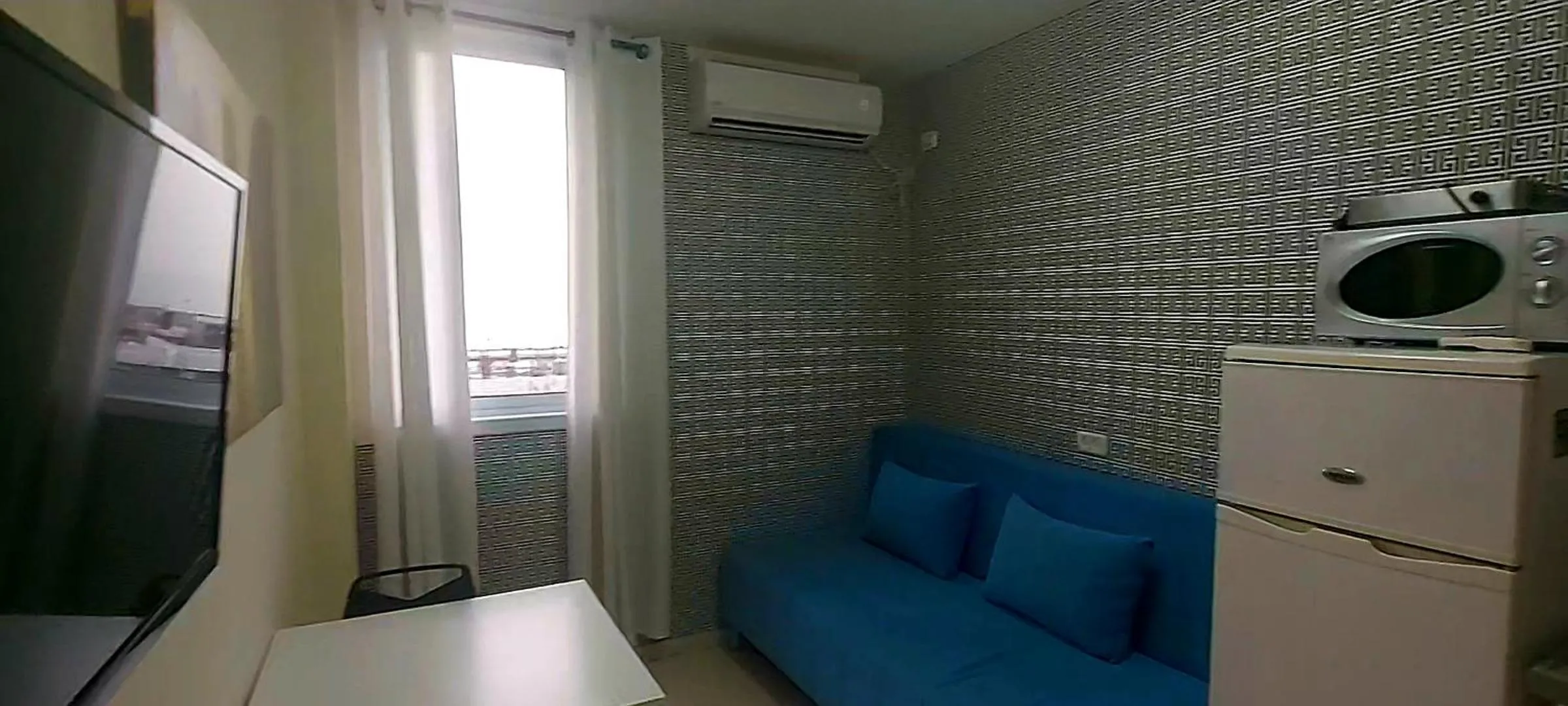 Bed in Beachfront Studio Apartment Bat Yam 412