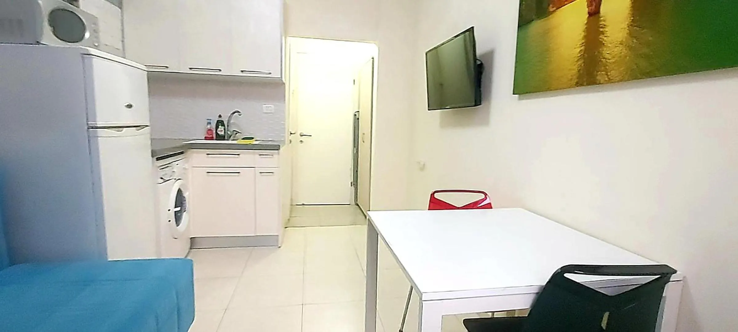 TV and multimedia in Beachfront Studio Apartment Bat Yam 412