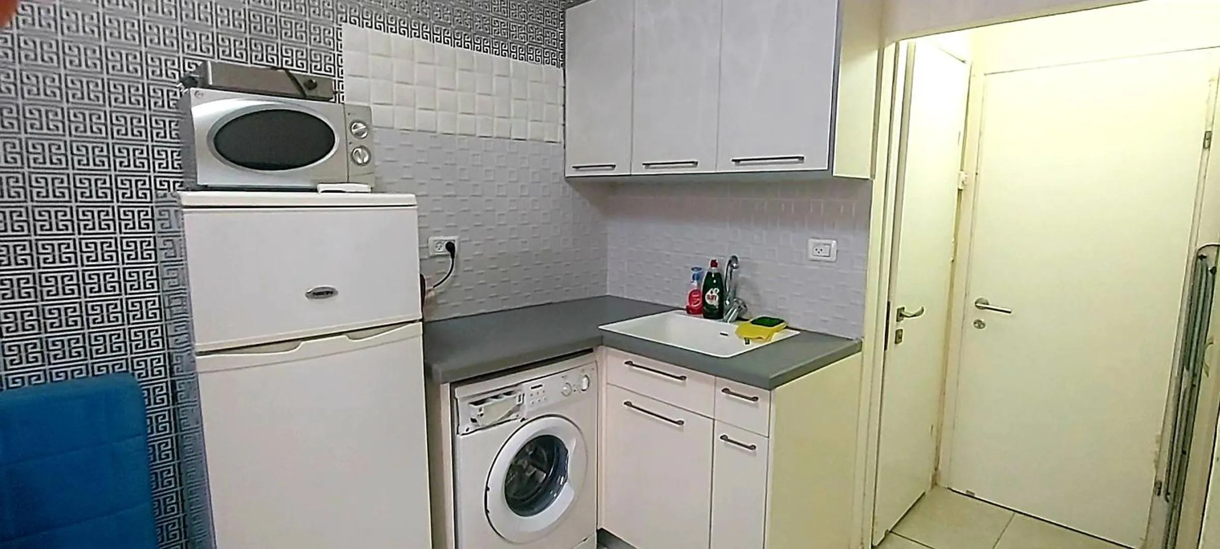 Kitchen or kitchenette in Beachfront Studio Apartment Bat Yam 412