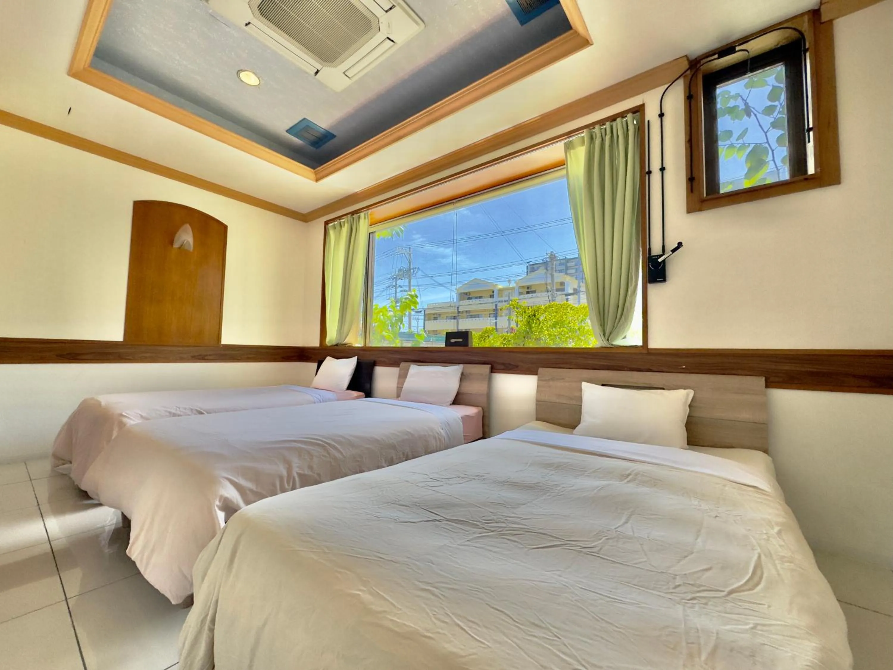 Bed in Araha Resort Arapana