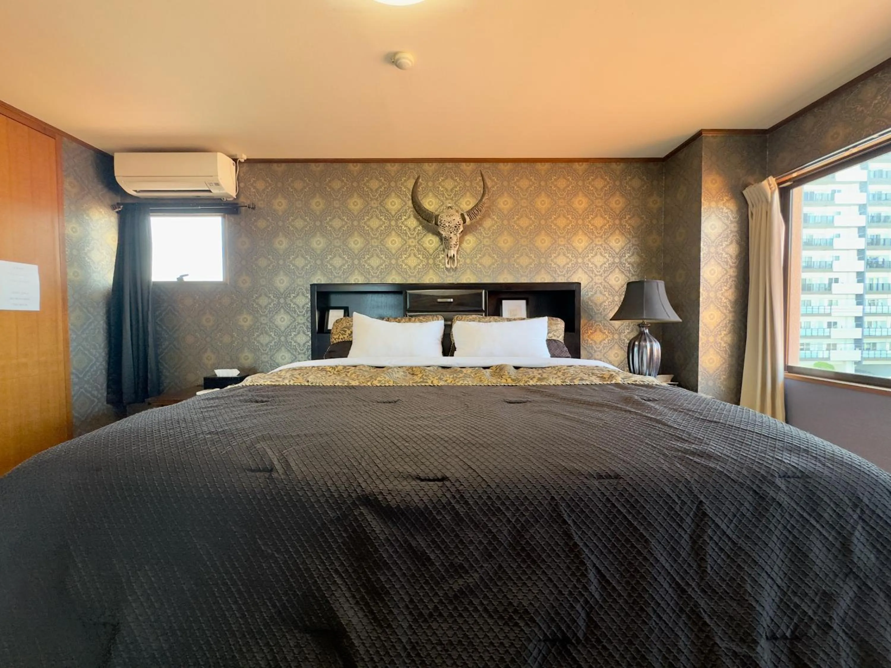 Bed in Araha Resort Arapana