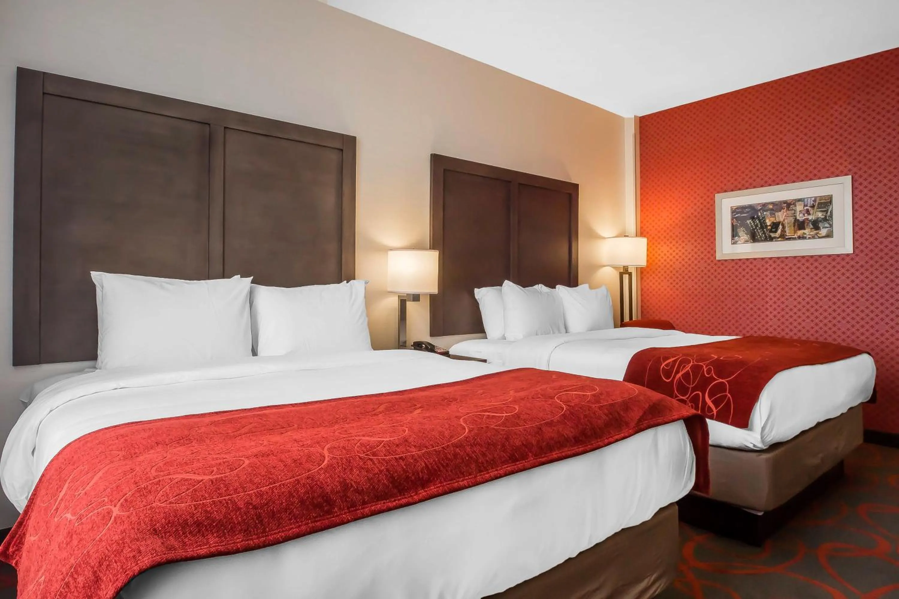 Bed in Comfort Inn & Suites near Stadium