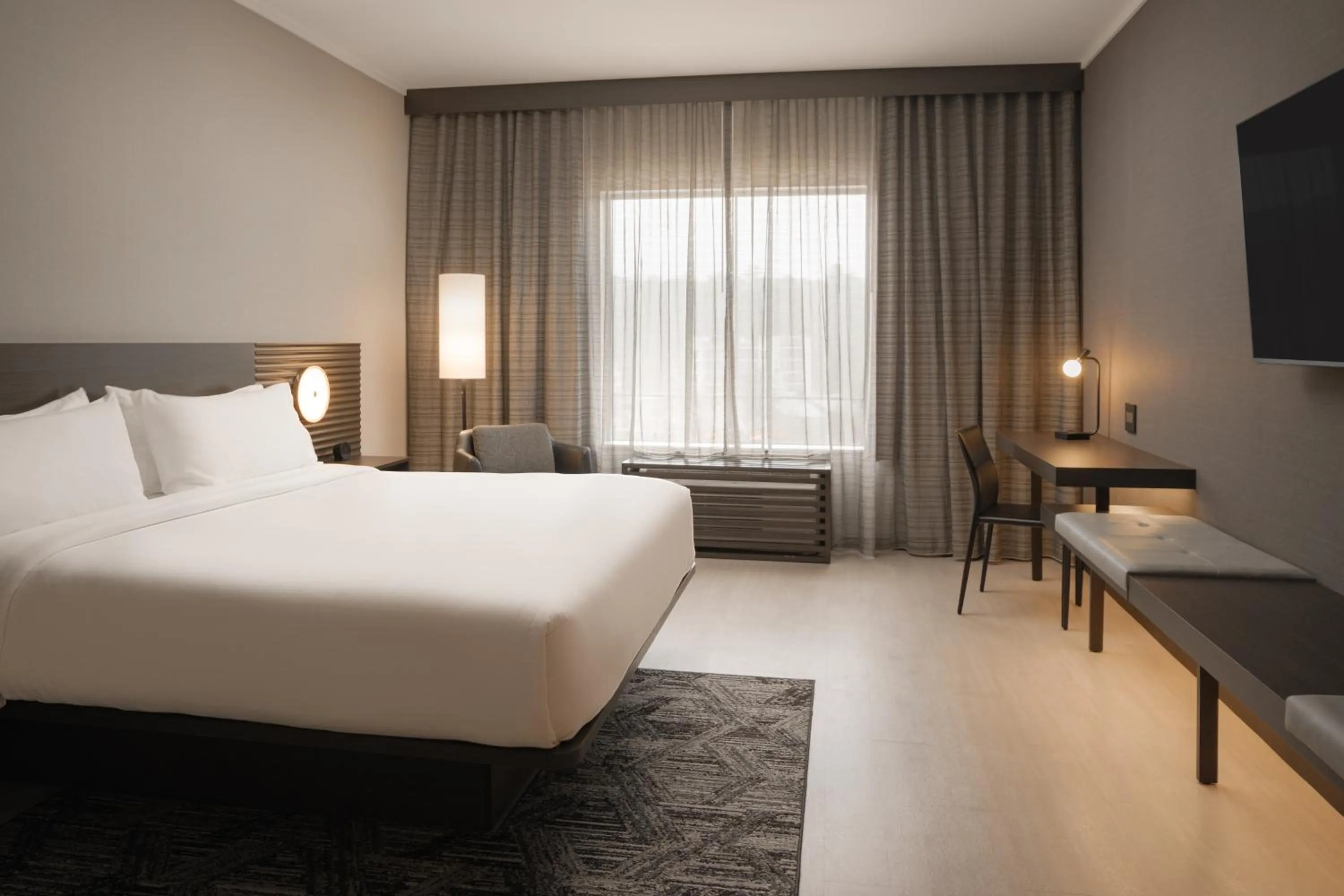 Bed in AC Hotel Asheville Biltmore Village