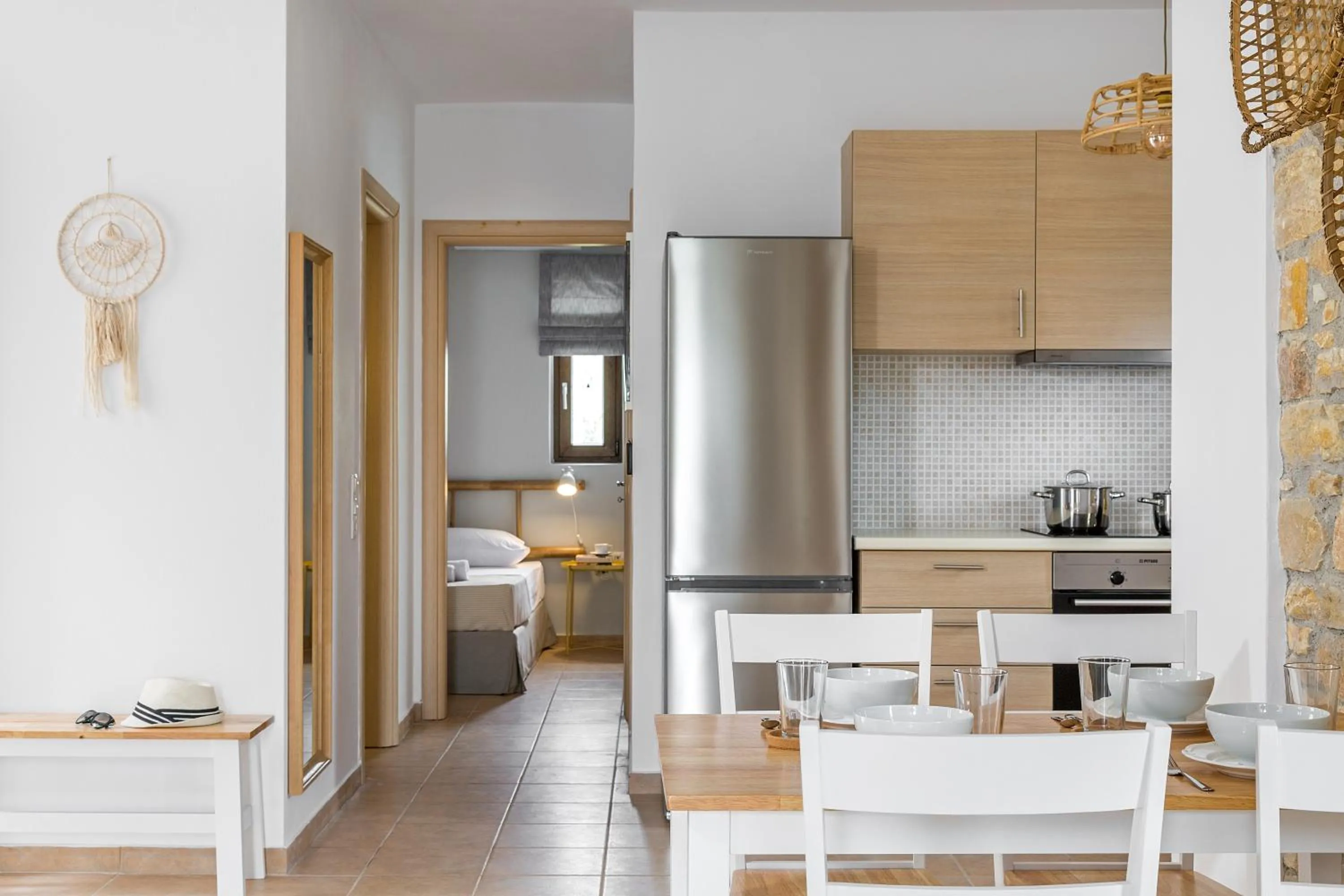 Kitchen or kitchenette in Syra Suites