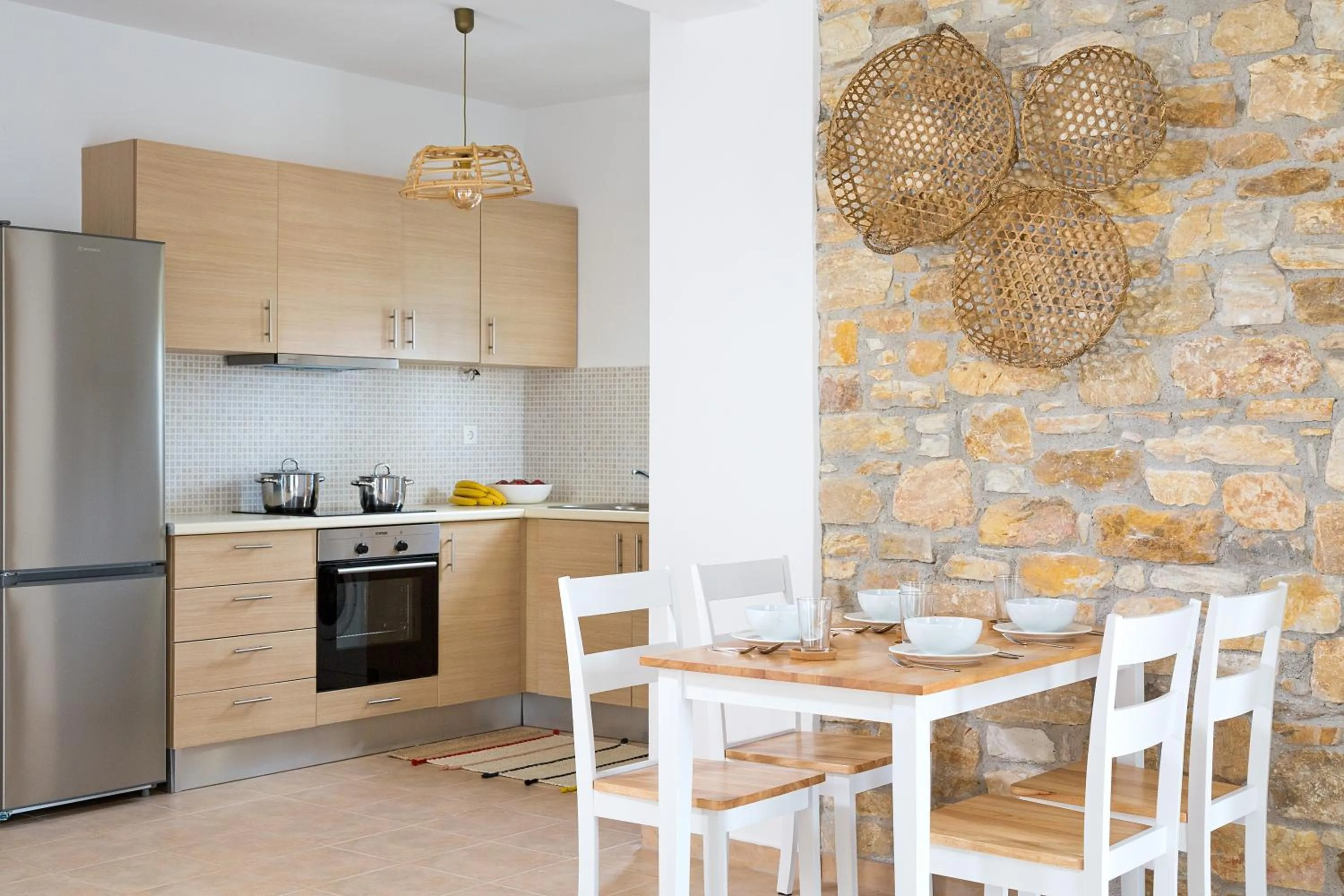 Kitchen or kitchenette in Syra Suites