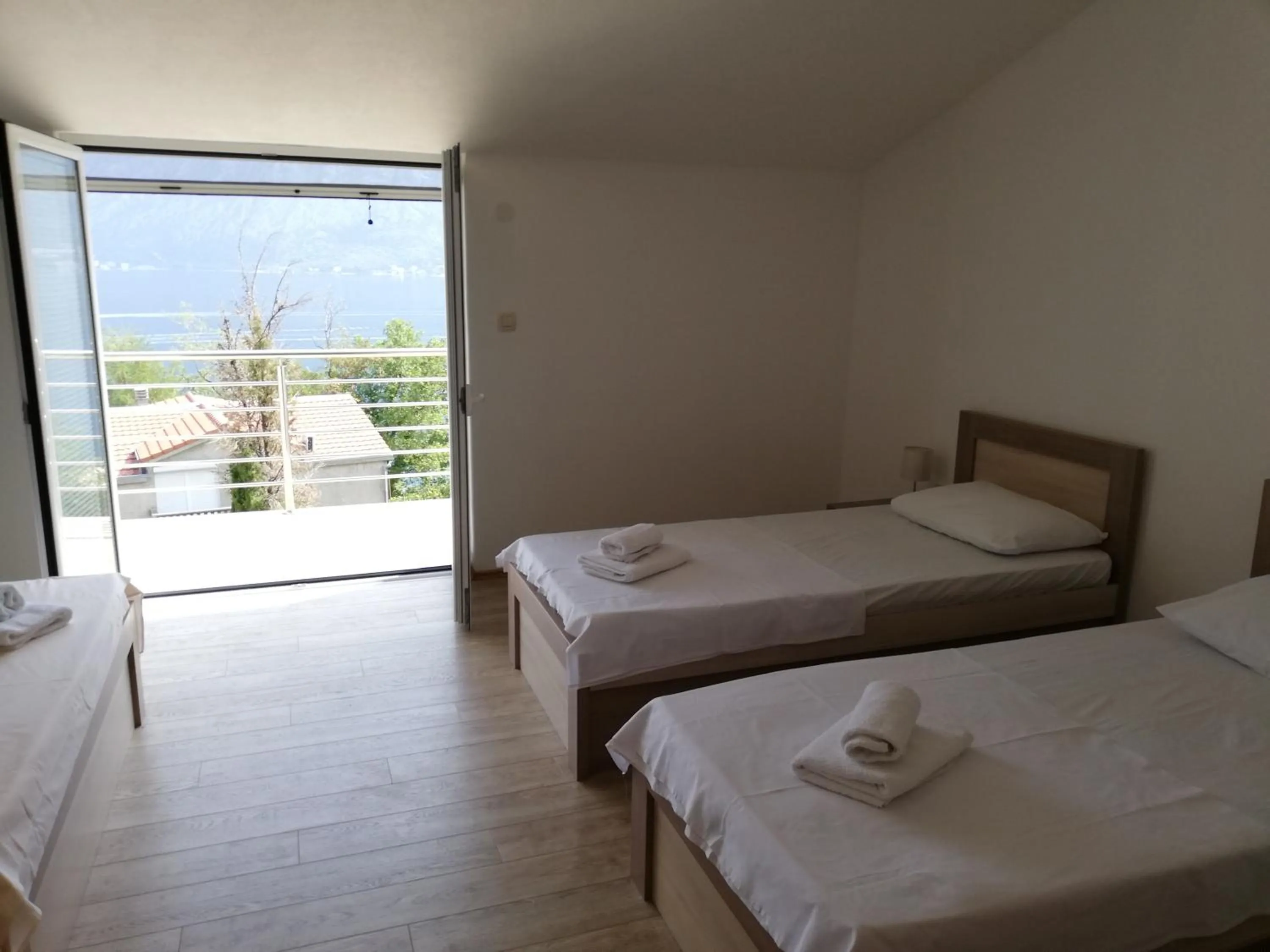 Bed in Ruža Apartments Sea View