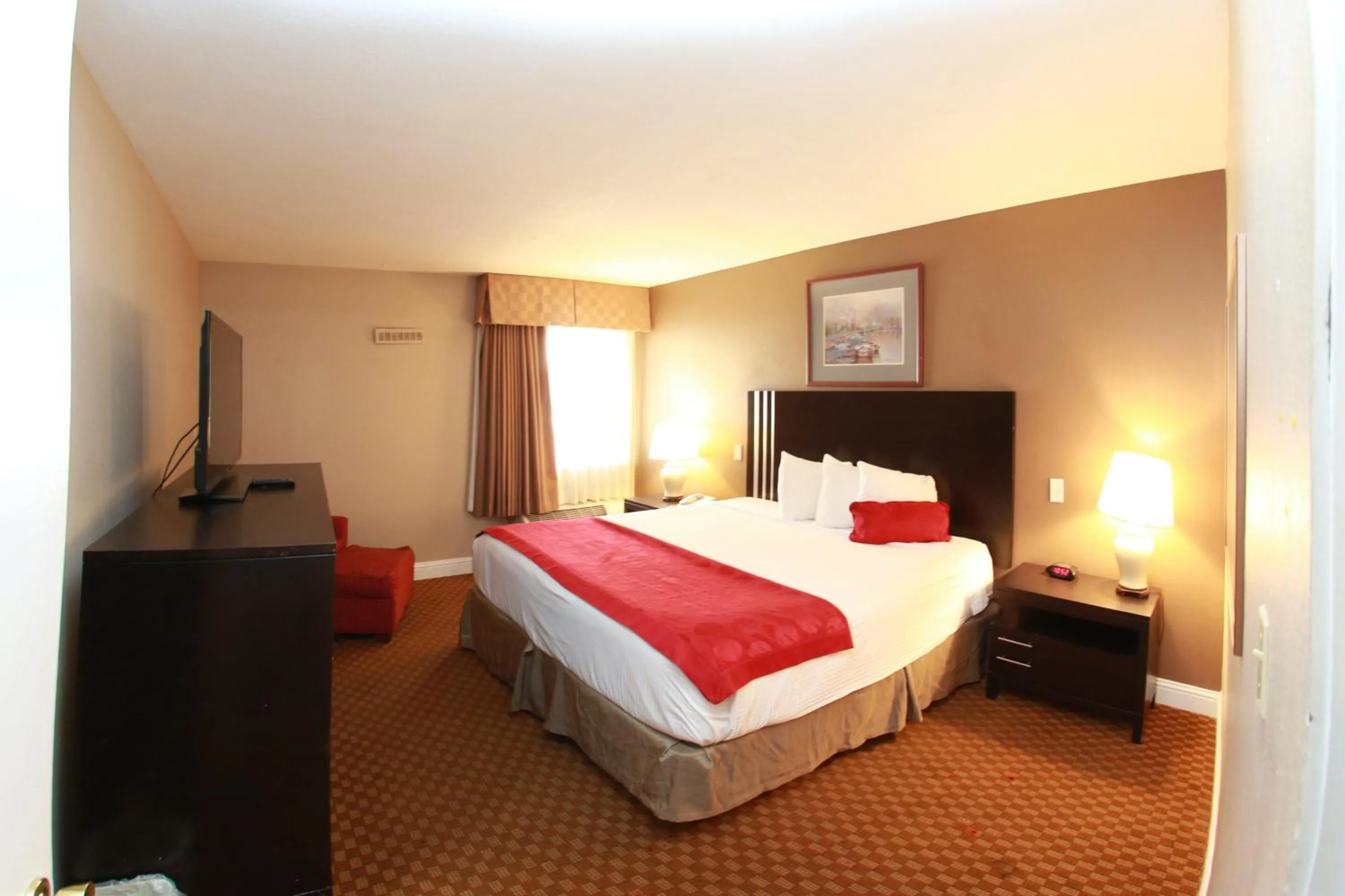 Bed in Ramada by Wyndham Fresno North