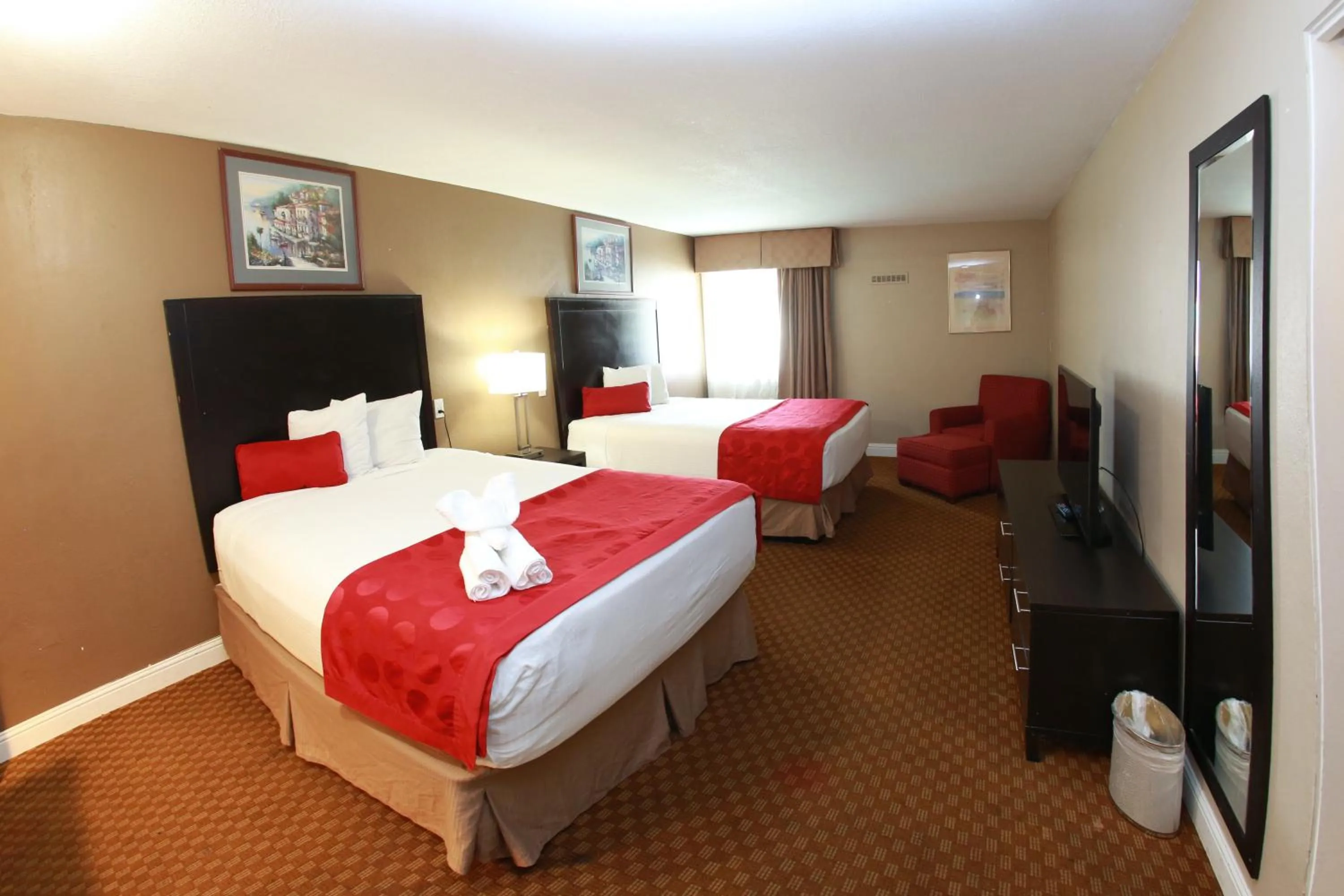 Bed in Ramada by Wyndham Fresno North