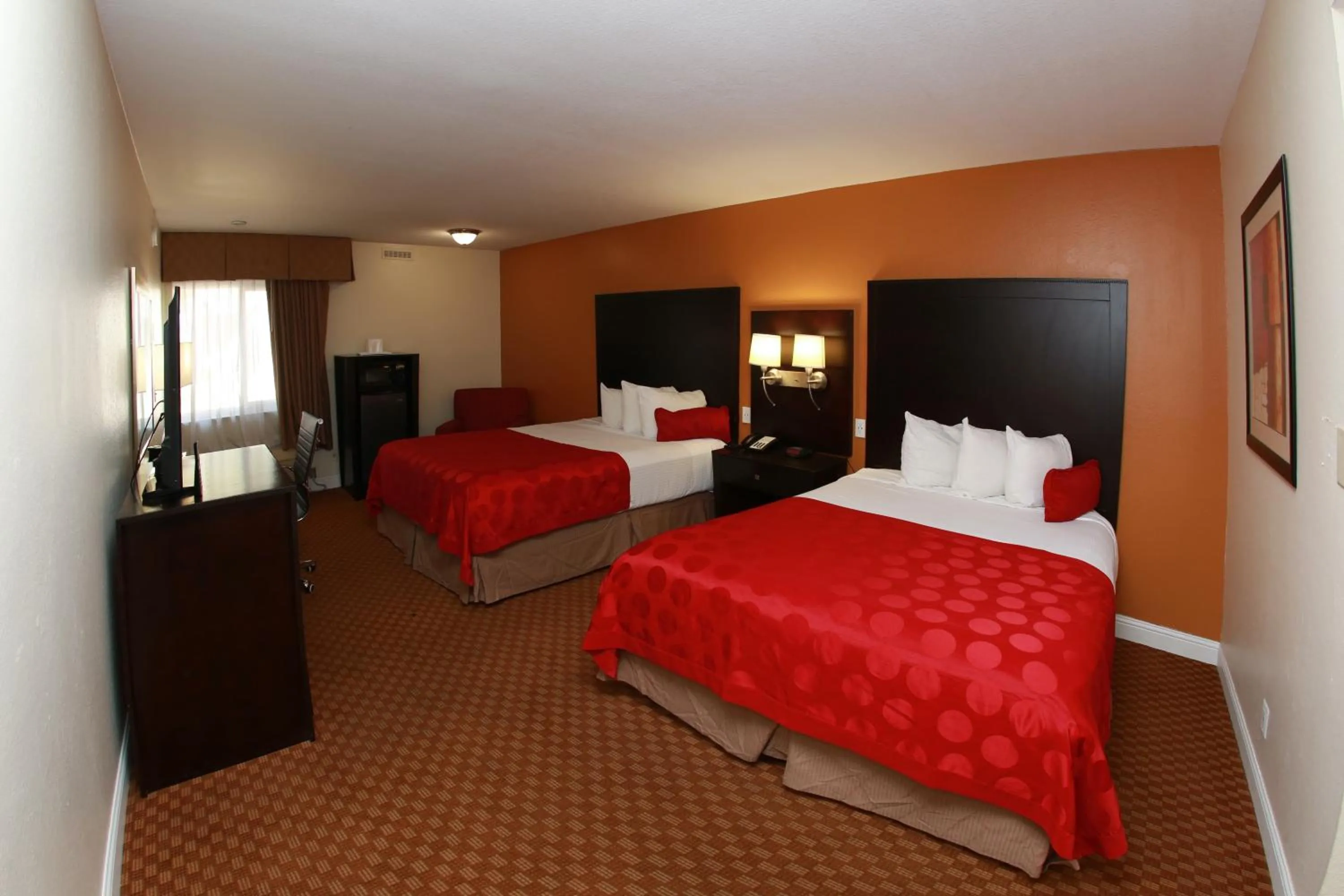 Bed in Ramada by Wyndham Fresno North