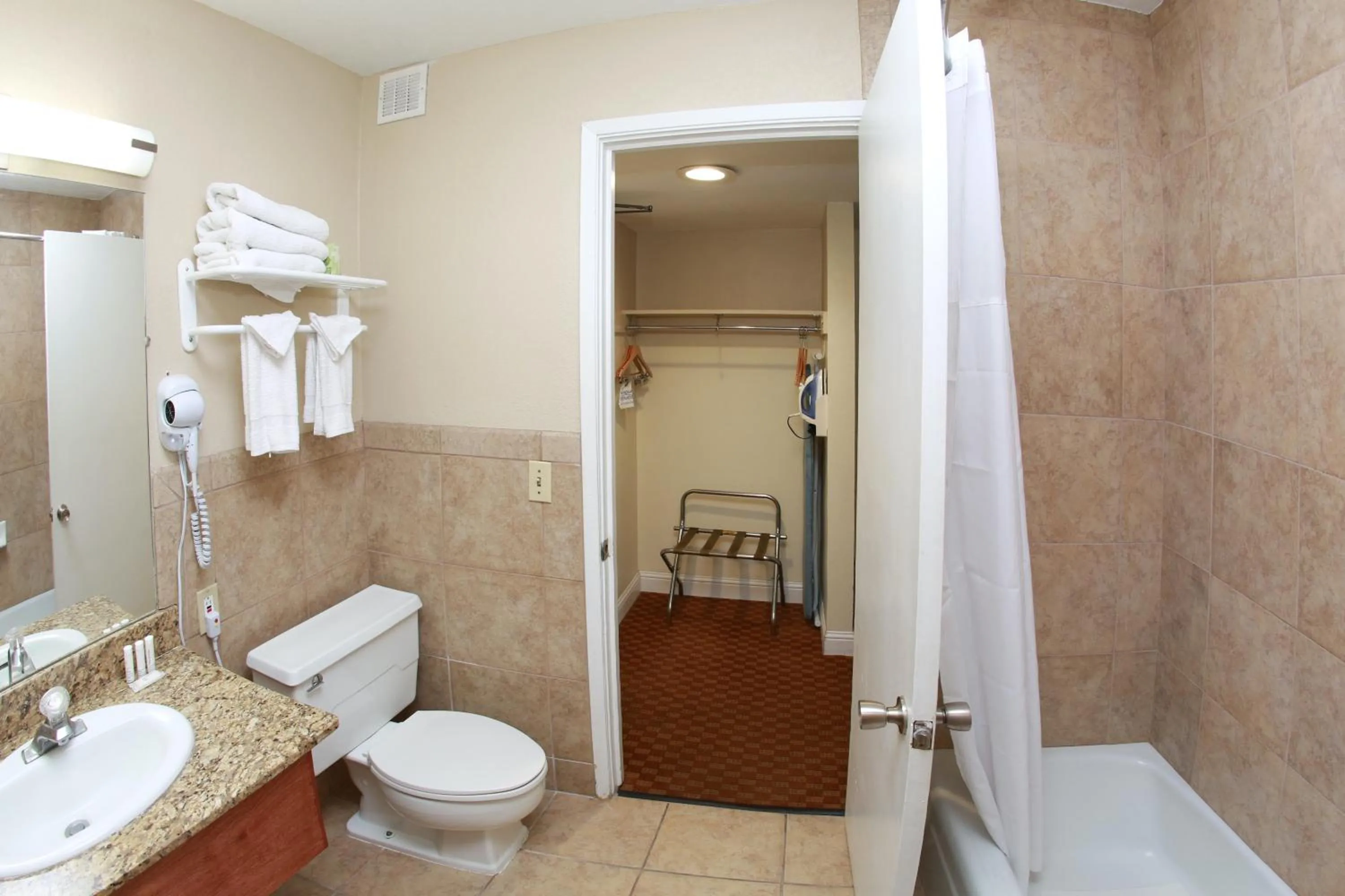 Shower in Ramada by Wyndham Fresno North