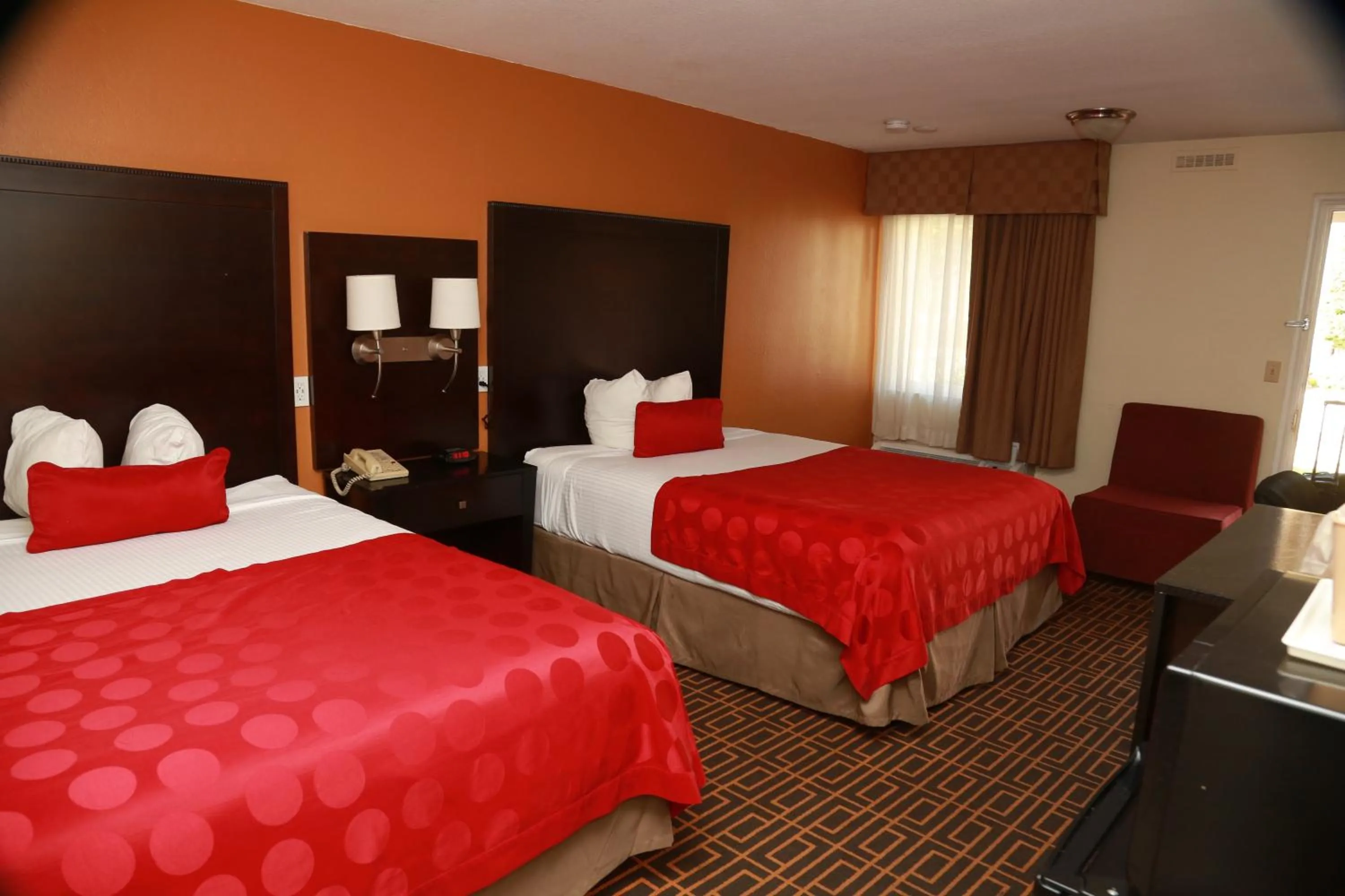 Bed in Ramada by Wyndham Fresno North