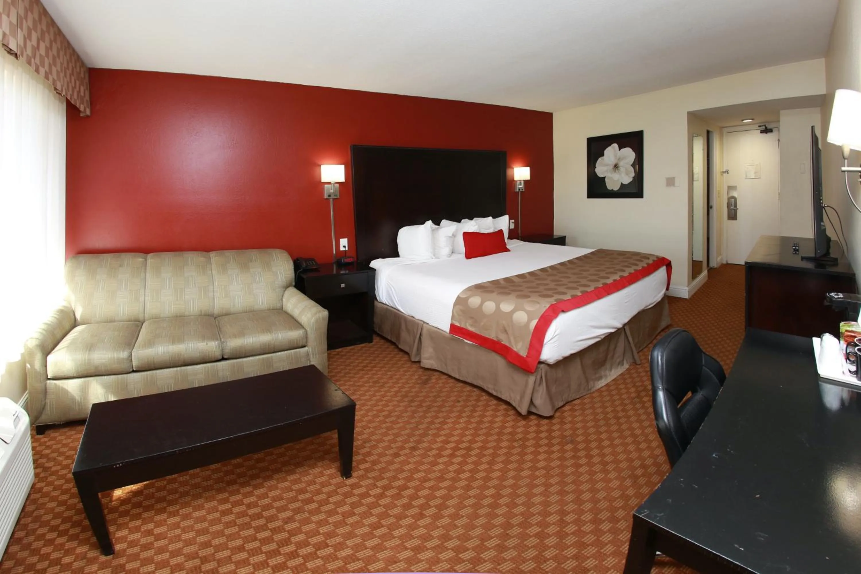 Bed in Ramada by Wyndham Fresno North