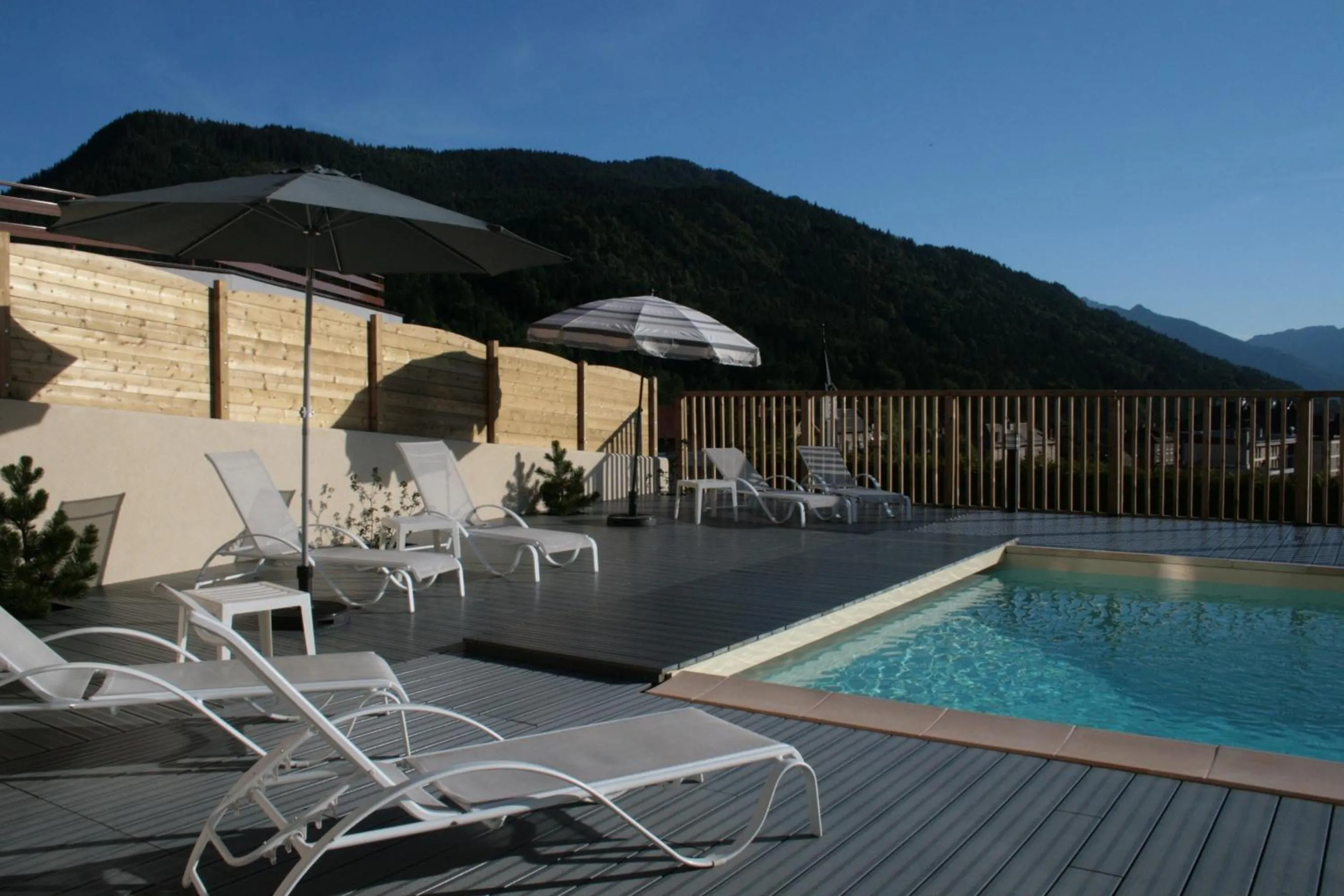 Swimming pool in Logis Hotel & Spa Beau-Site
