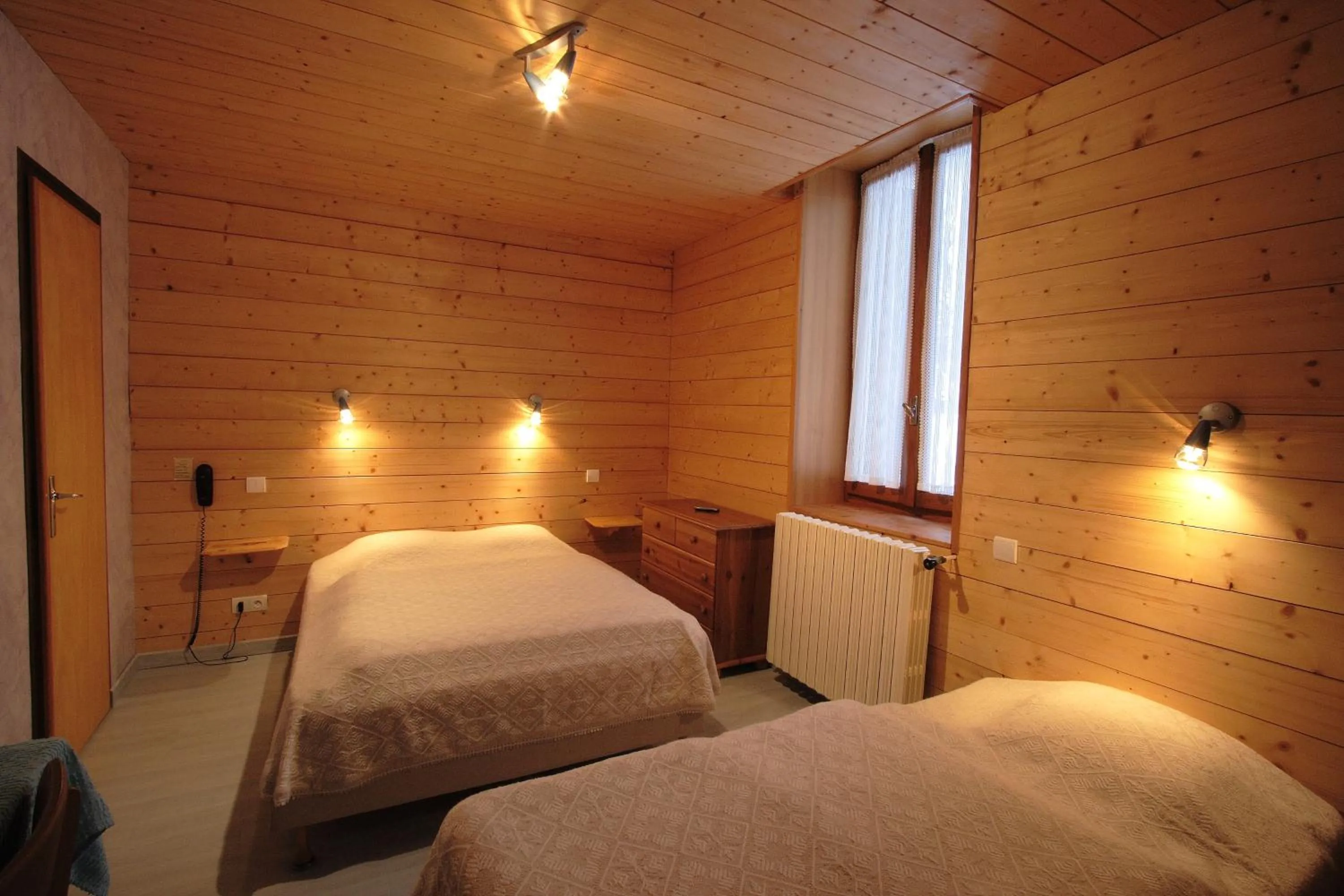 Bedroom, Bed in Logis Hotel & Spa Beau-Site