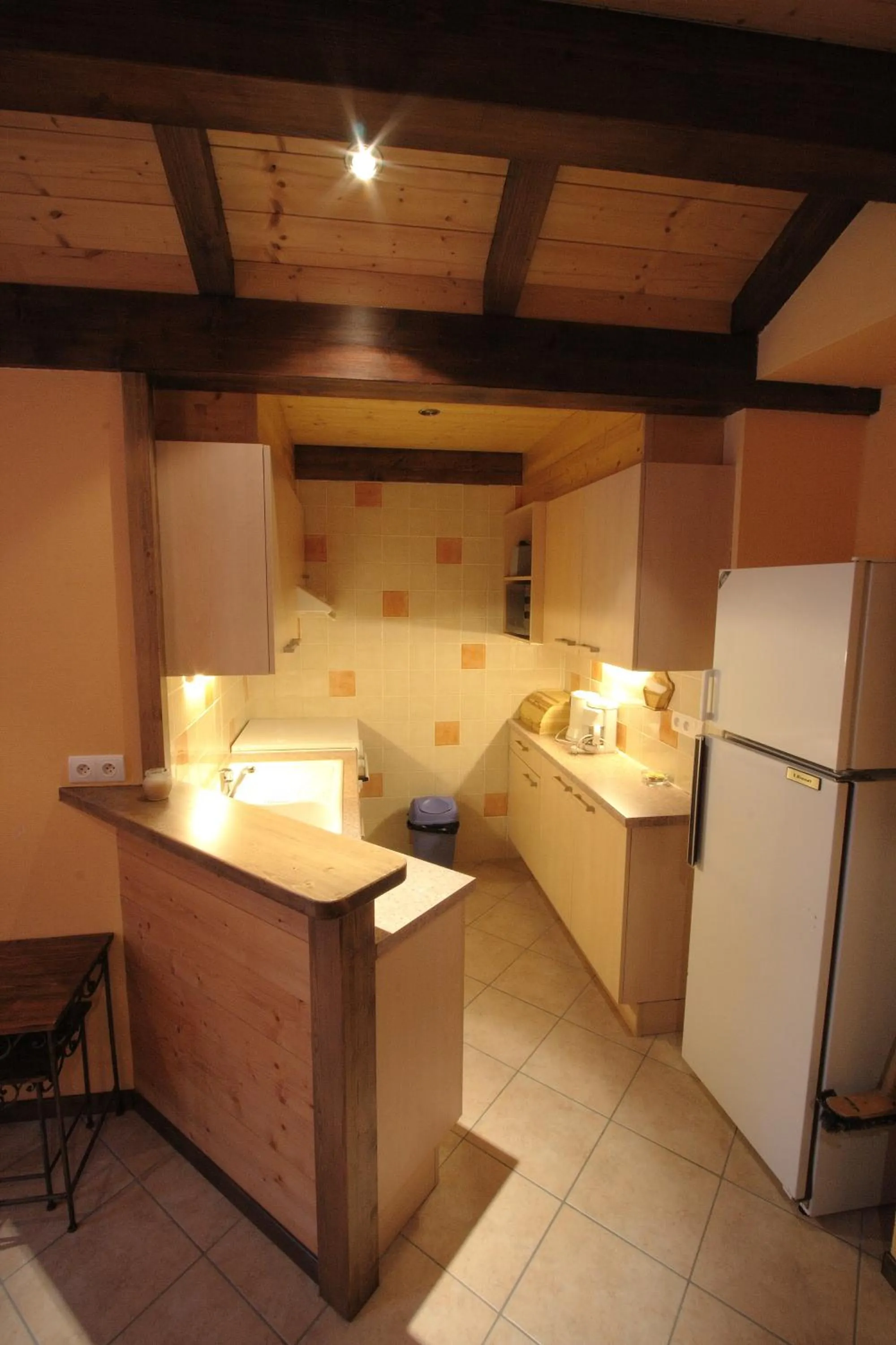 Kitchen or kitchenette in Logis Hotel & Spa Beau-Site