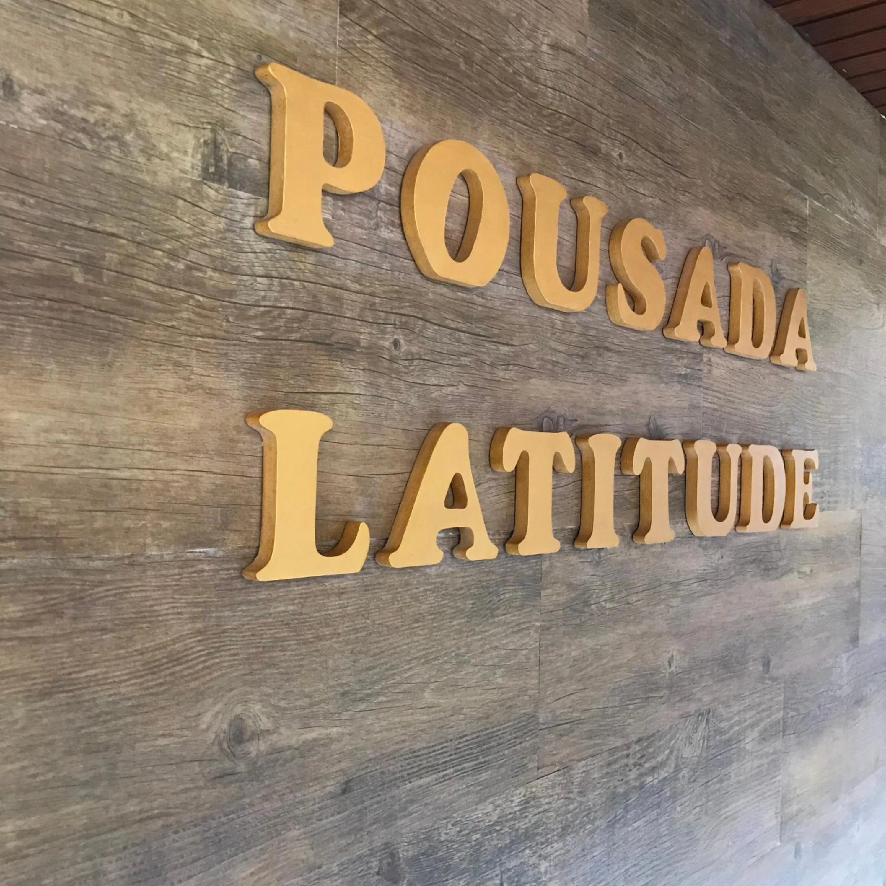 Property logo or sign in Hotel Pousada Latitude