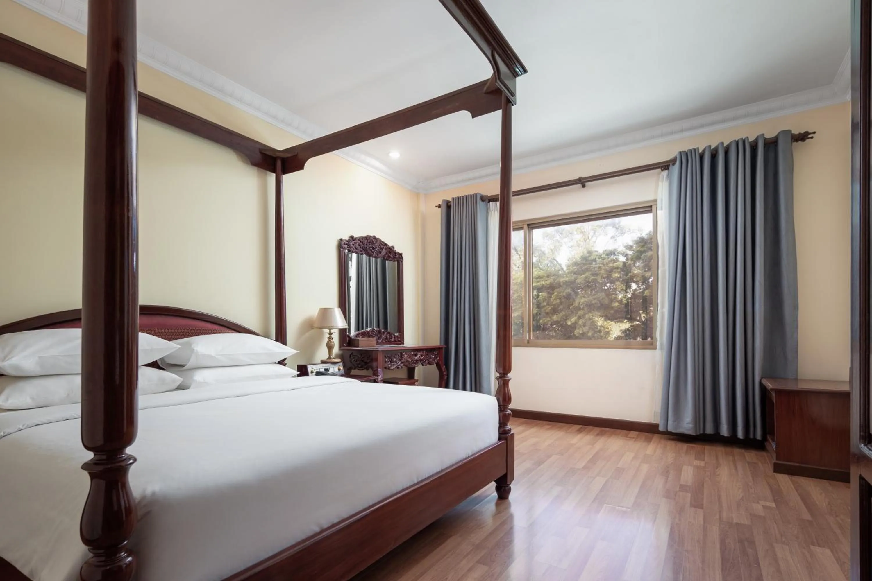 Bed in Angkor Holiday Hotel