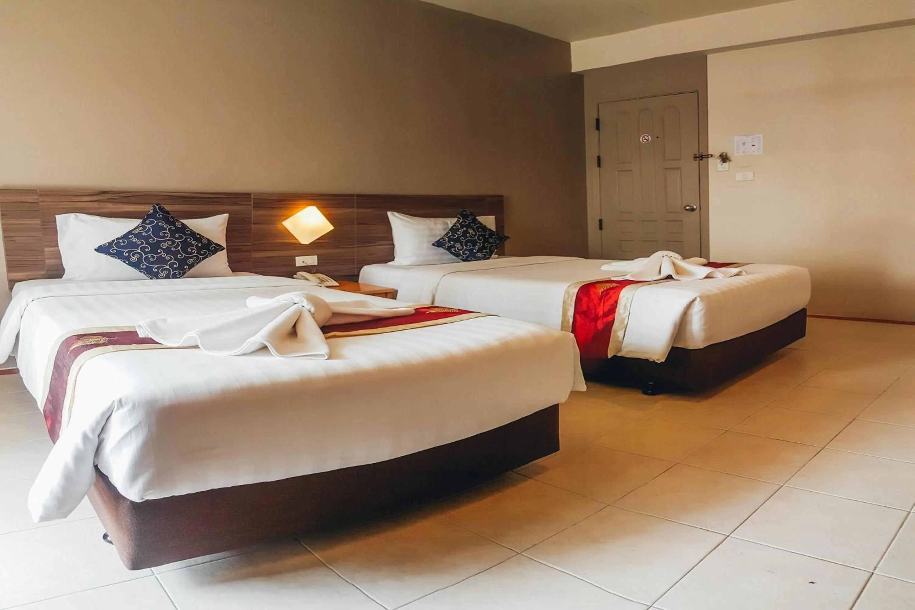 Bed in Eastiny Inn Hotel