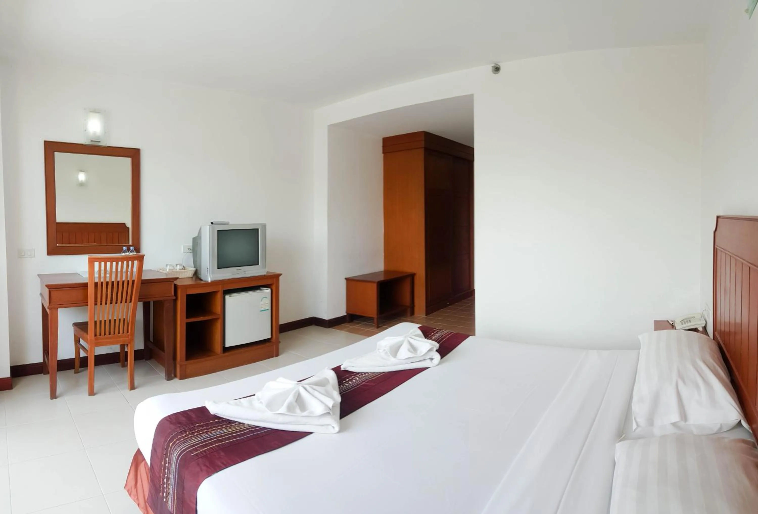 Bed in Eastiny Seven Hotel