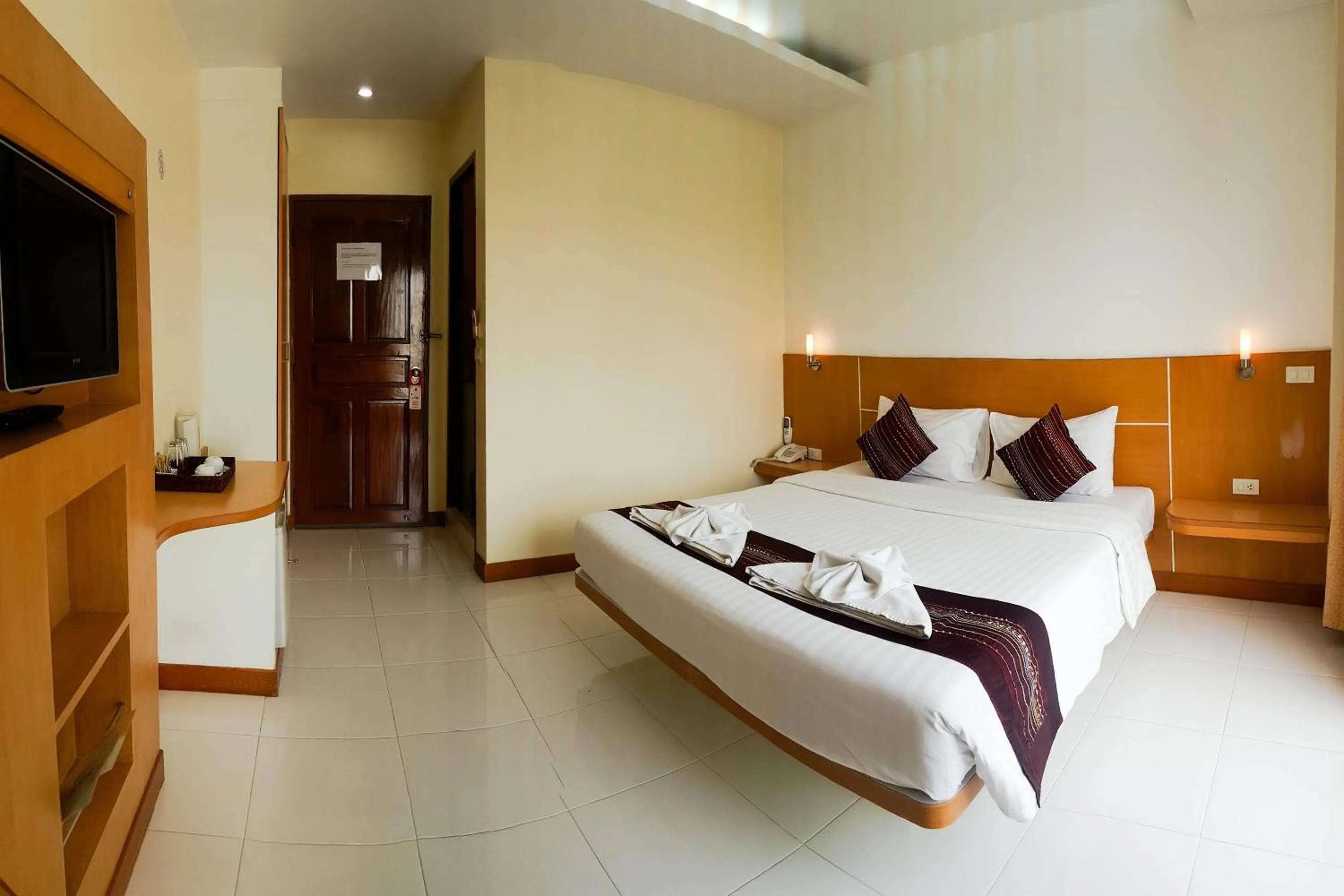 Bed in Eastiny Seven Hotel