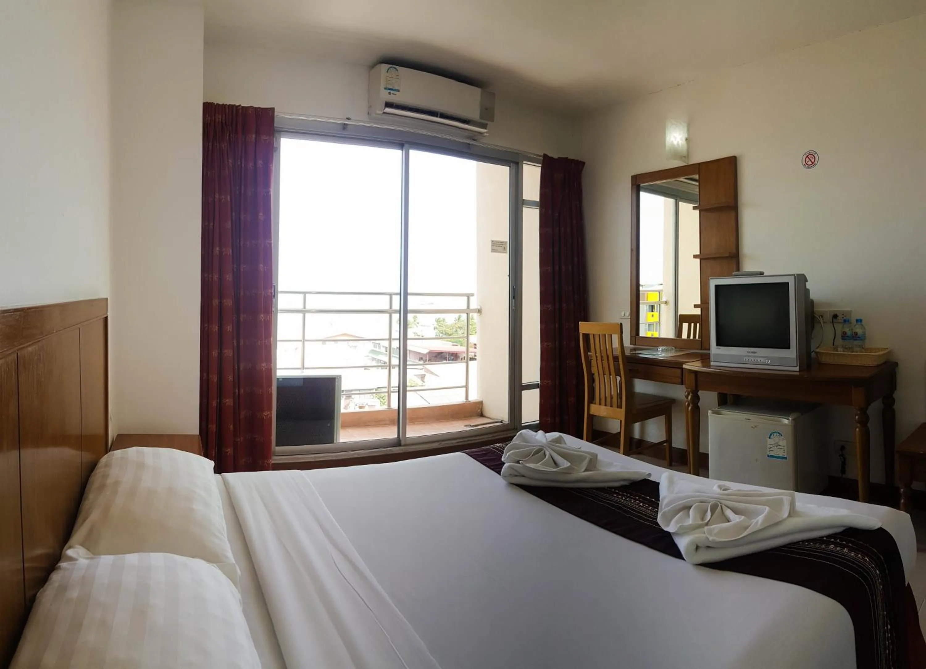 Bed in Eastiny Seven Hotel