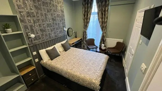 Bedroom, Bed in Charlotte Guest House