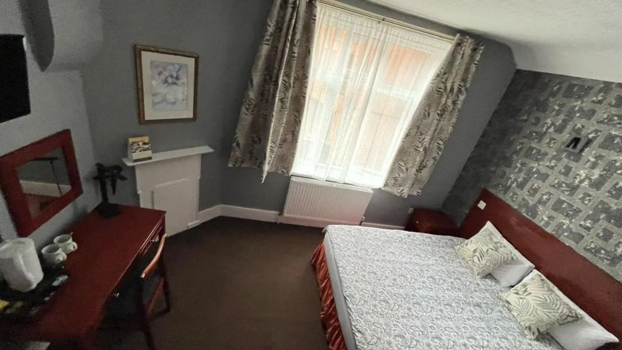 Bedroom, Bed in Charlotte Guest House