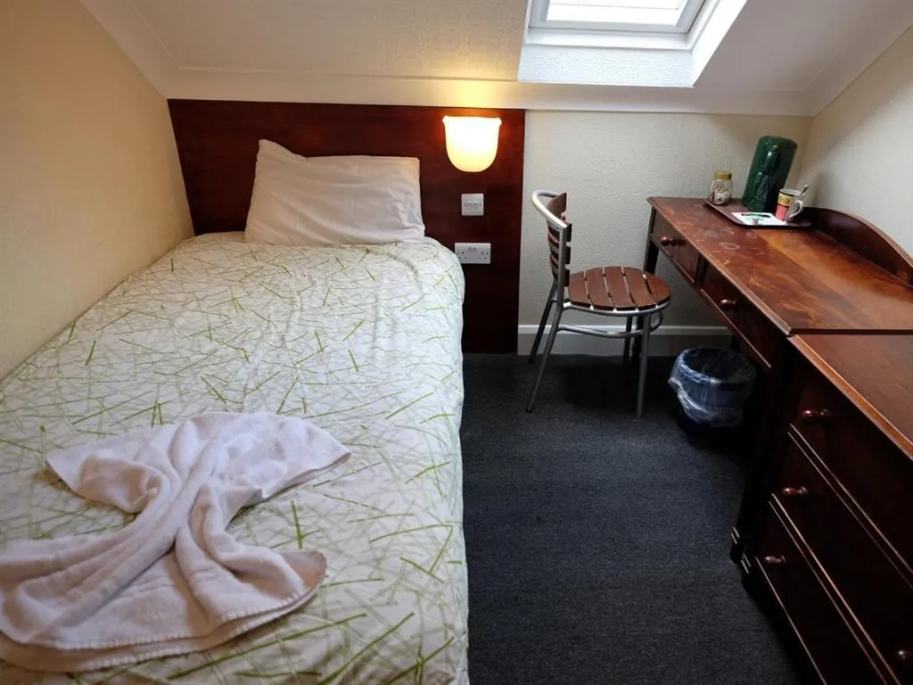 Bedroom, Bed in Charlotte Guest House