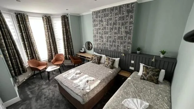 Bedroom, Bed in Charlotte Guest House