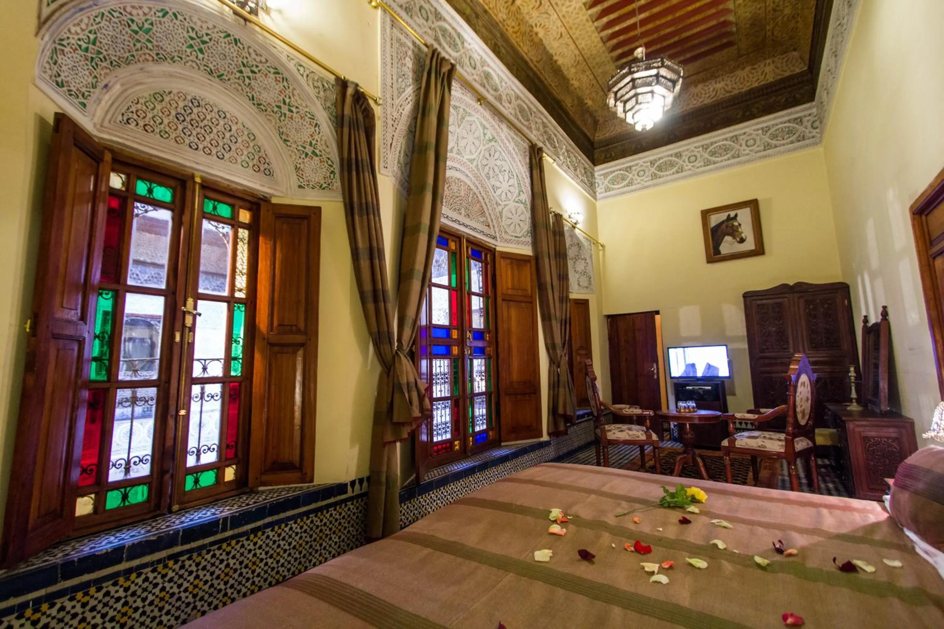 Seating area, Bed in Riad Ibn Khaldoun