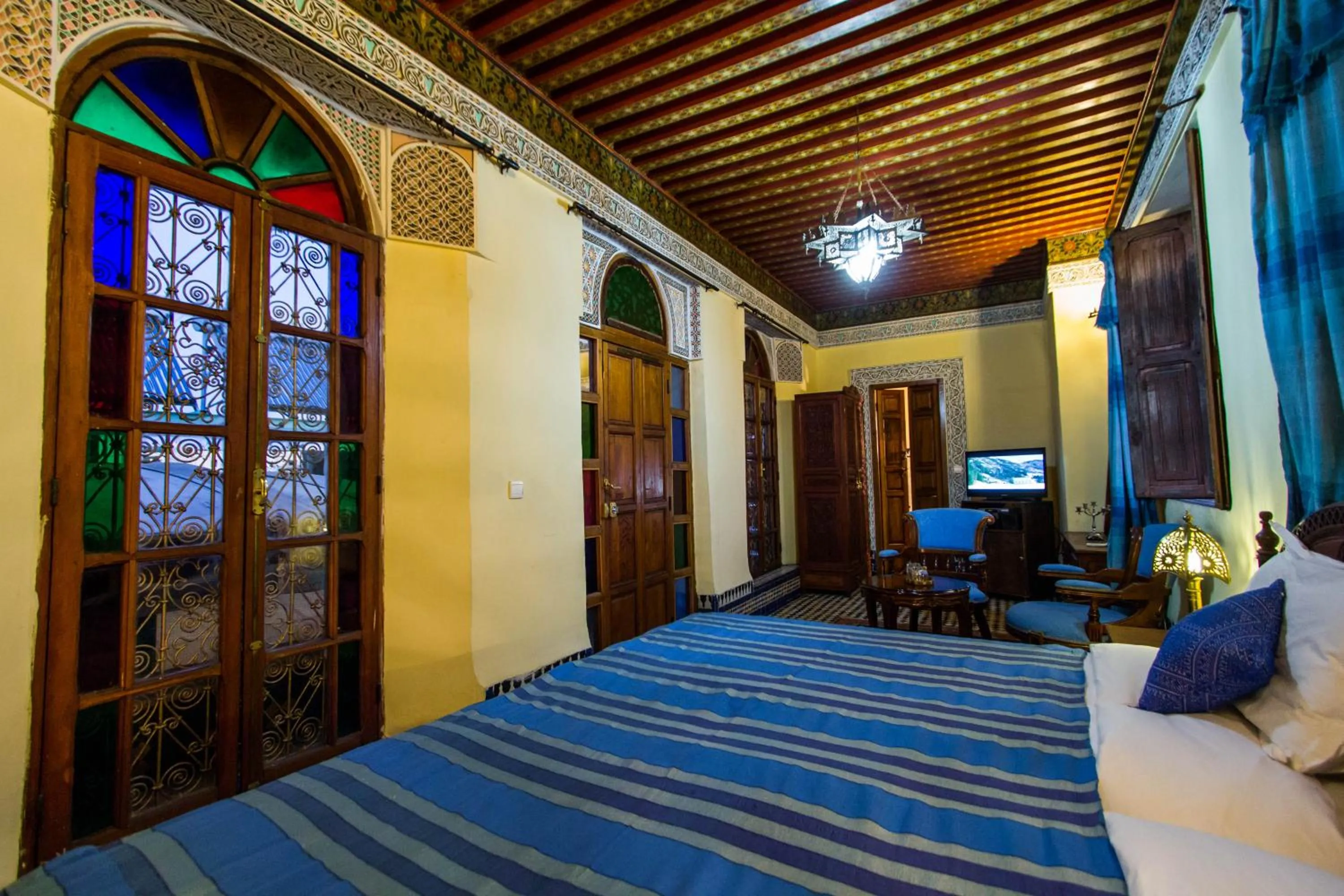 Seating area, Bed in Riad Ibn Khaldoun