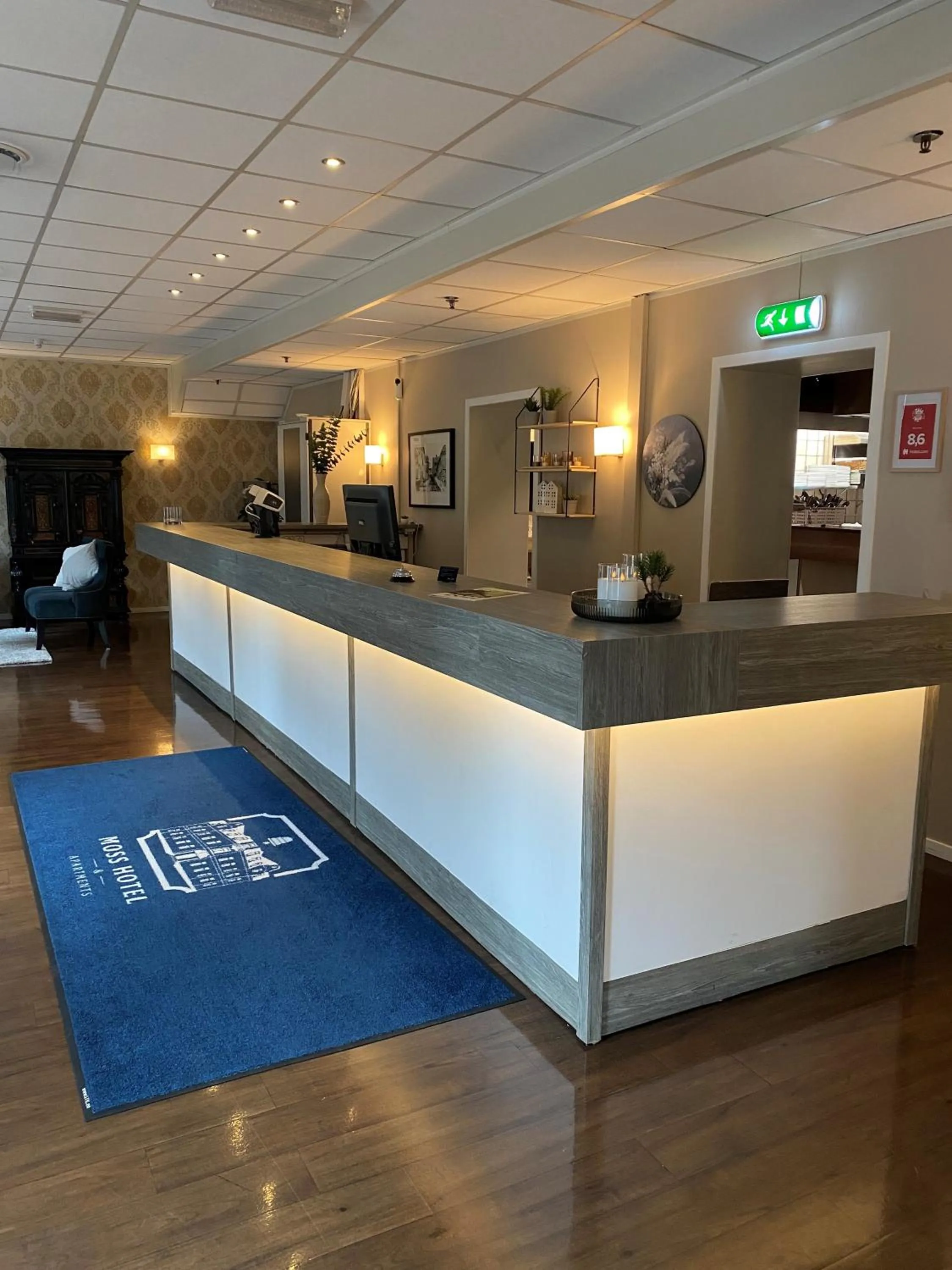 Lobby or reception in Moss Hotel & Apartments
