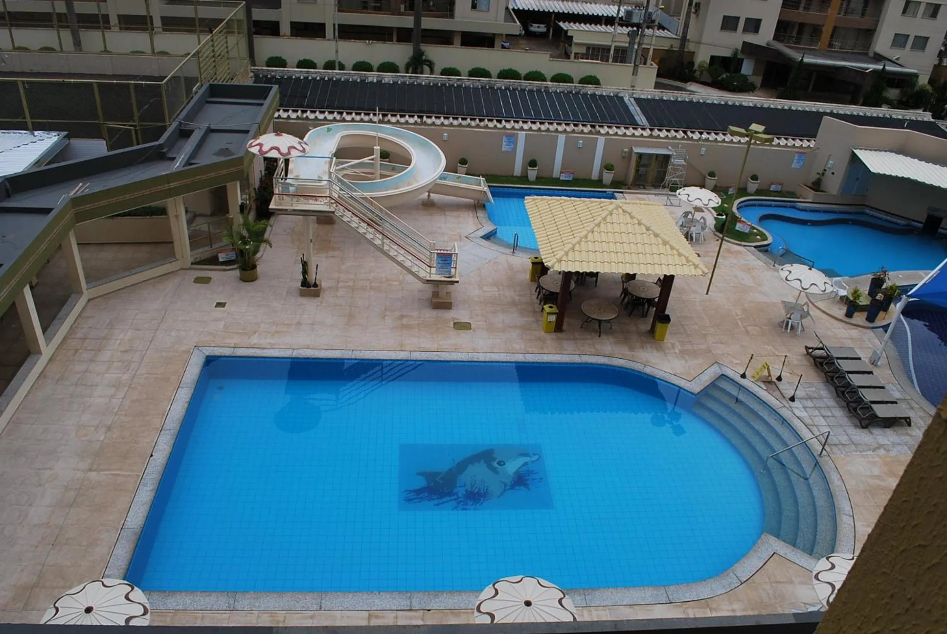 Swimming pool in Prive das Thermas I Caldas Novas - ACHEI FERIAS - com roupa de cama