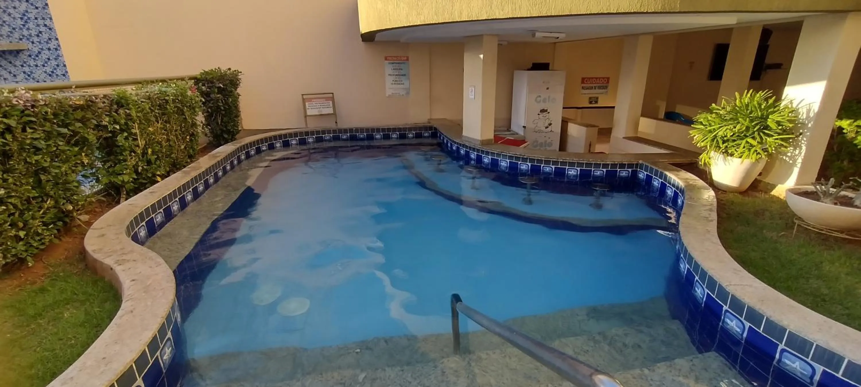 Swimming pool in Prive das Thermas I Caldas Novas - ACHEI FERIAS - com roupa de cama