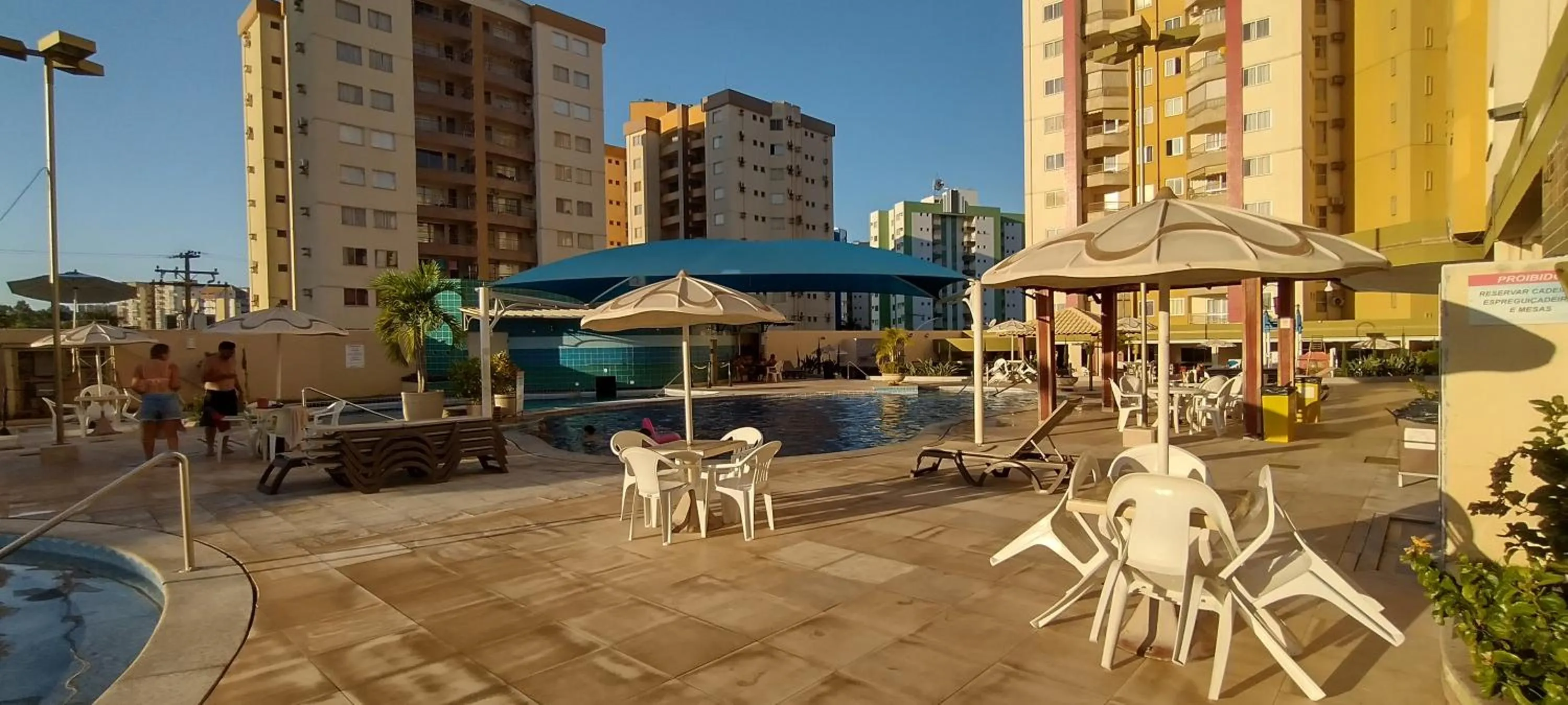 Seating area in Prive das Thermas I Caldas Novas - ACHEI FERIAS - com roupa de cama