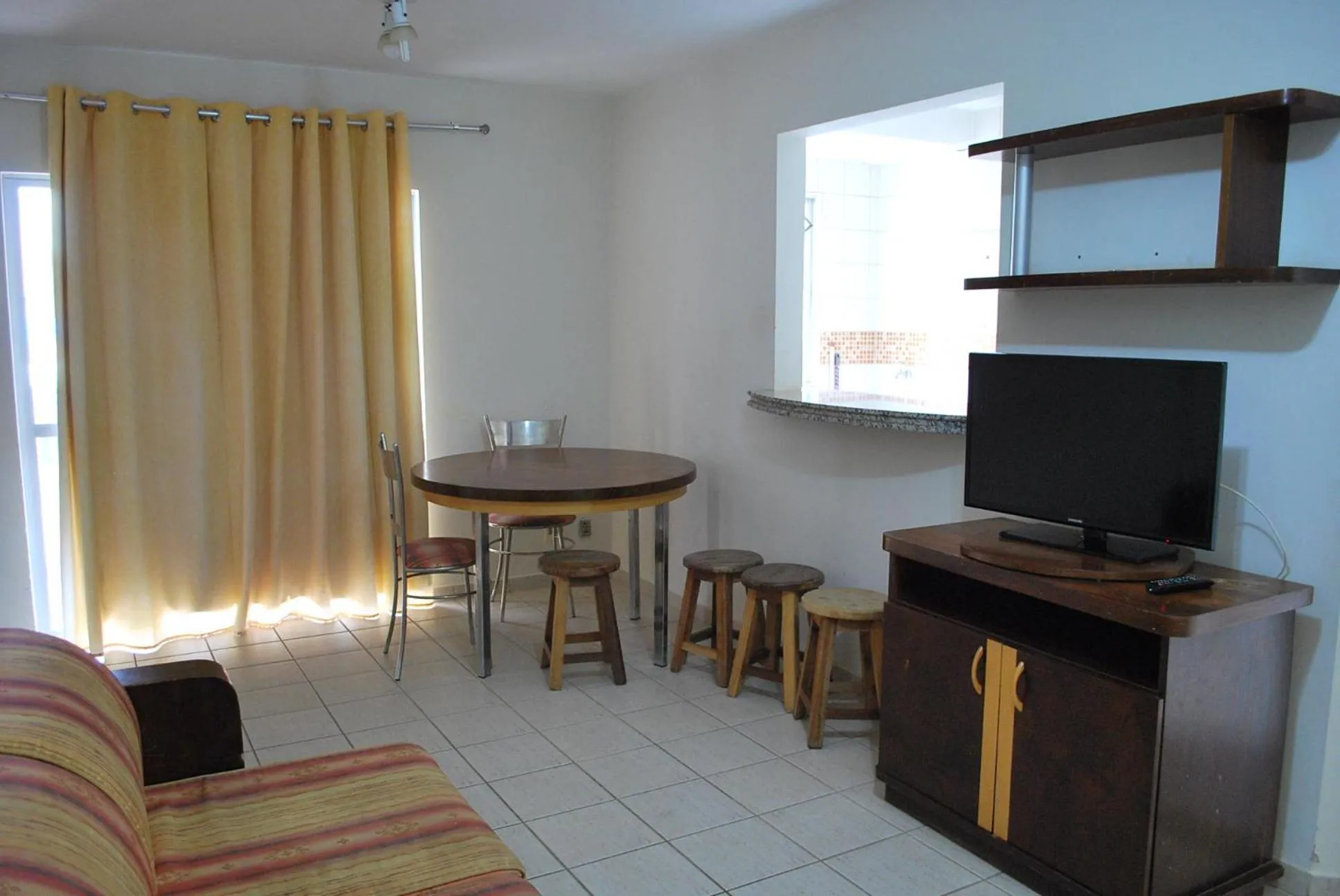 Seating area in Prive das Thermas I Caldas Novas - ACHEI FERIAS - com roupa de cama