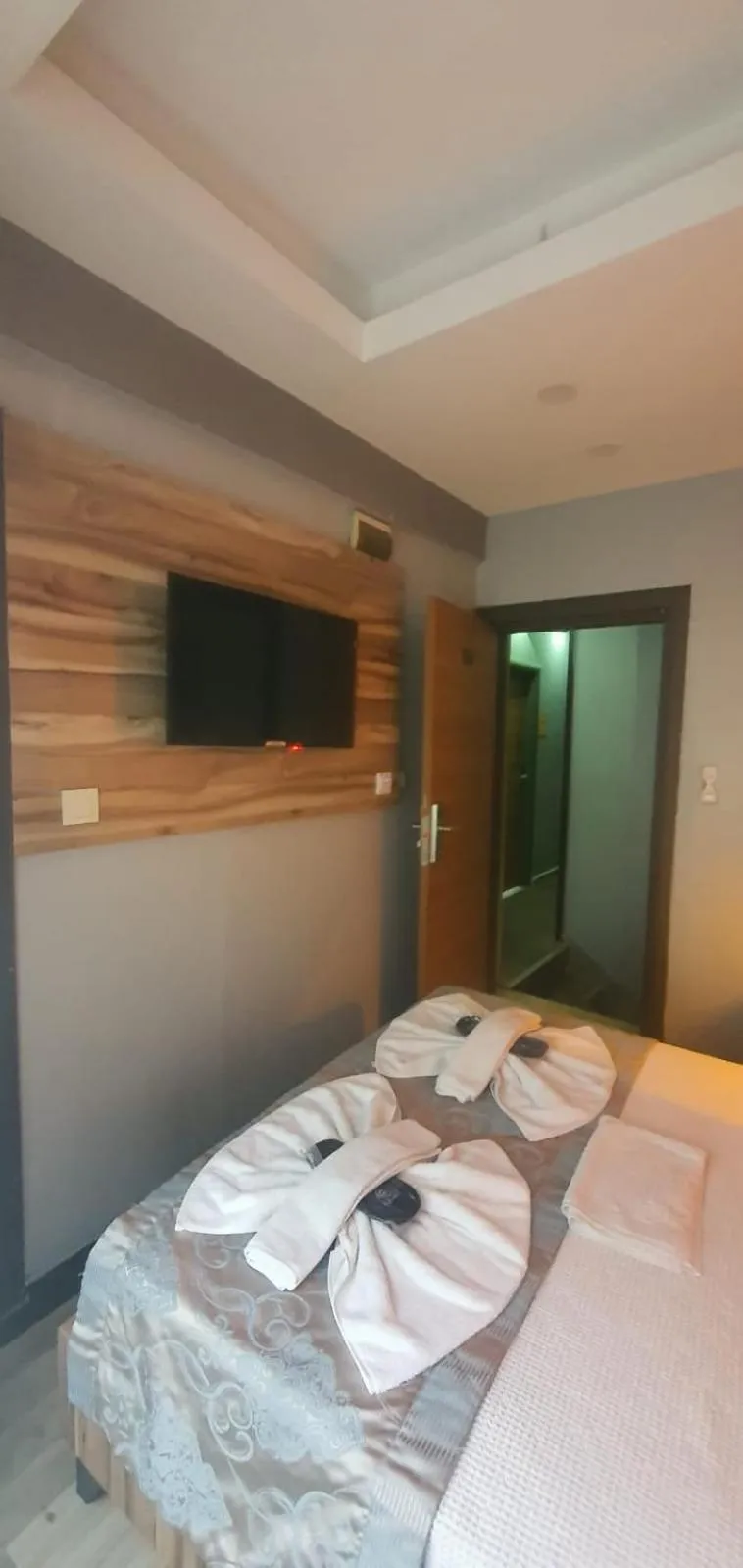 Bed in Grand Esen Hotel