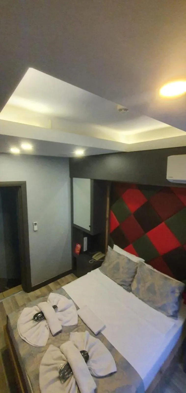 Bed in Grand Esen Hotel